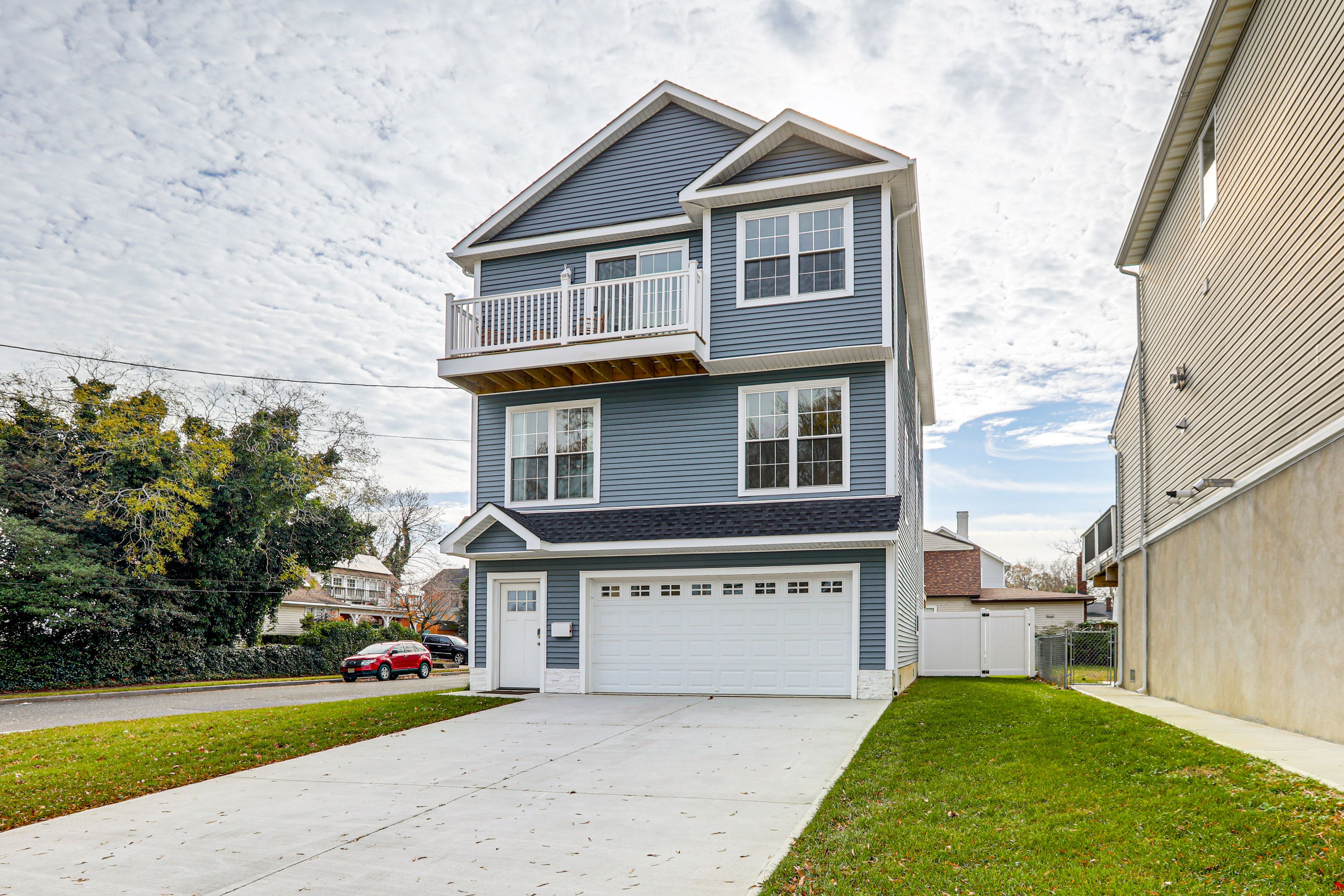 Exterior | Driveway (4 Vehicles) | Free Street Parking