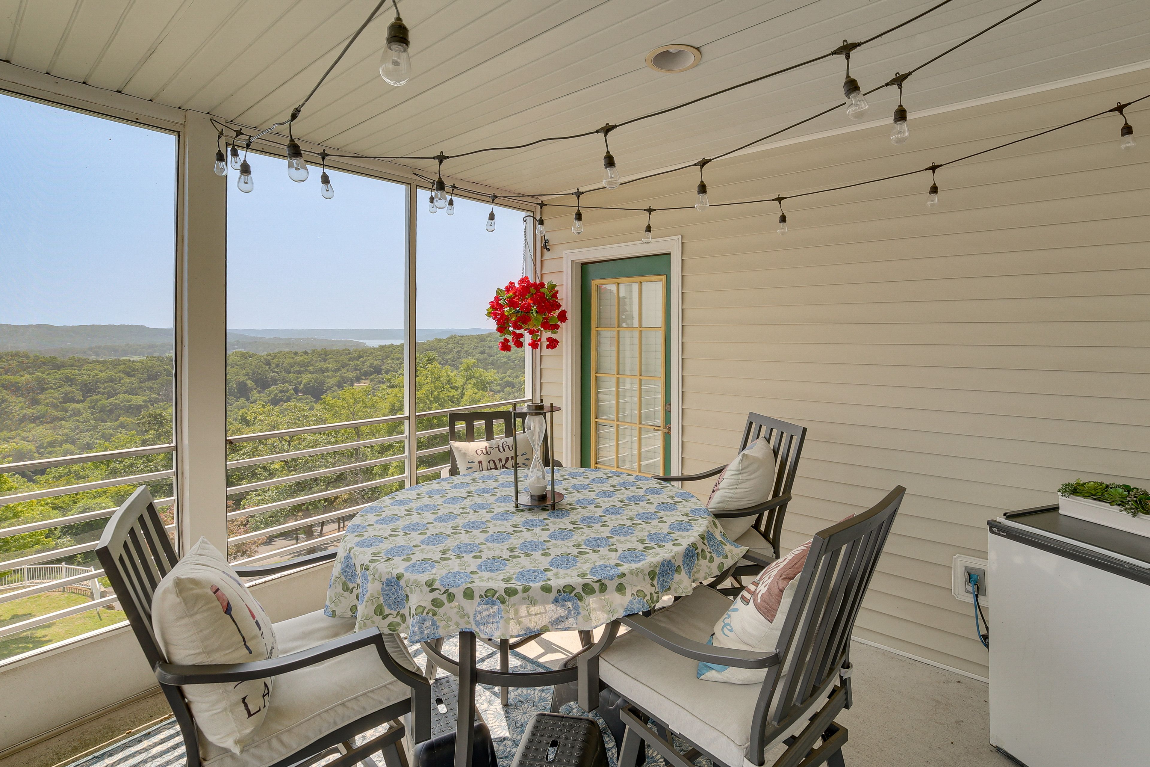 Screened-In Balcony | Dining Area | Lake & Mountain Views