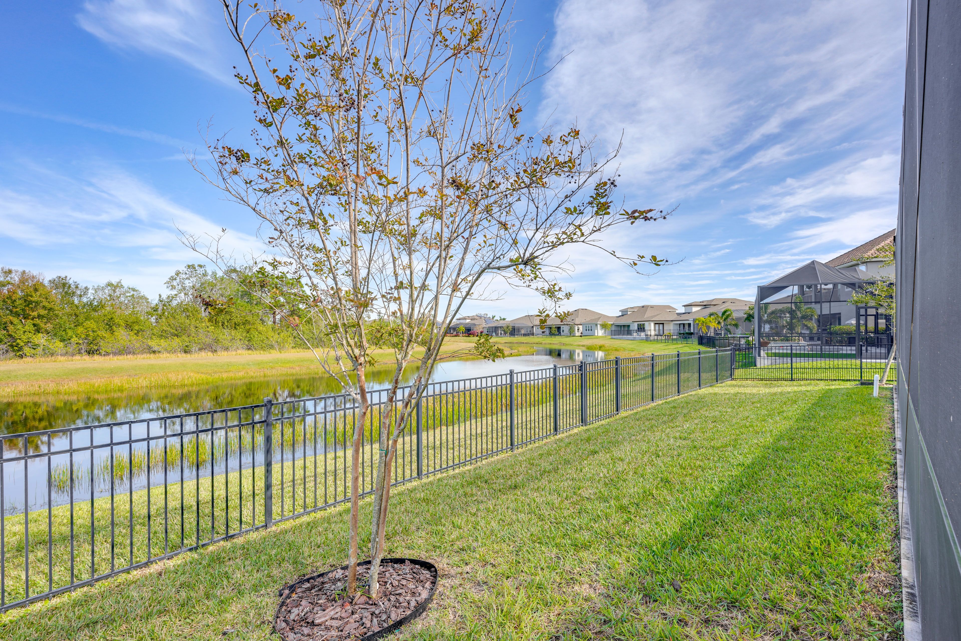 Fenced-In Yard | Canal Views
