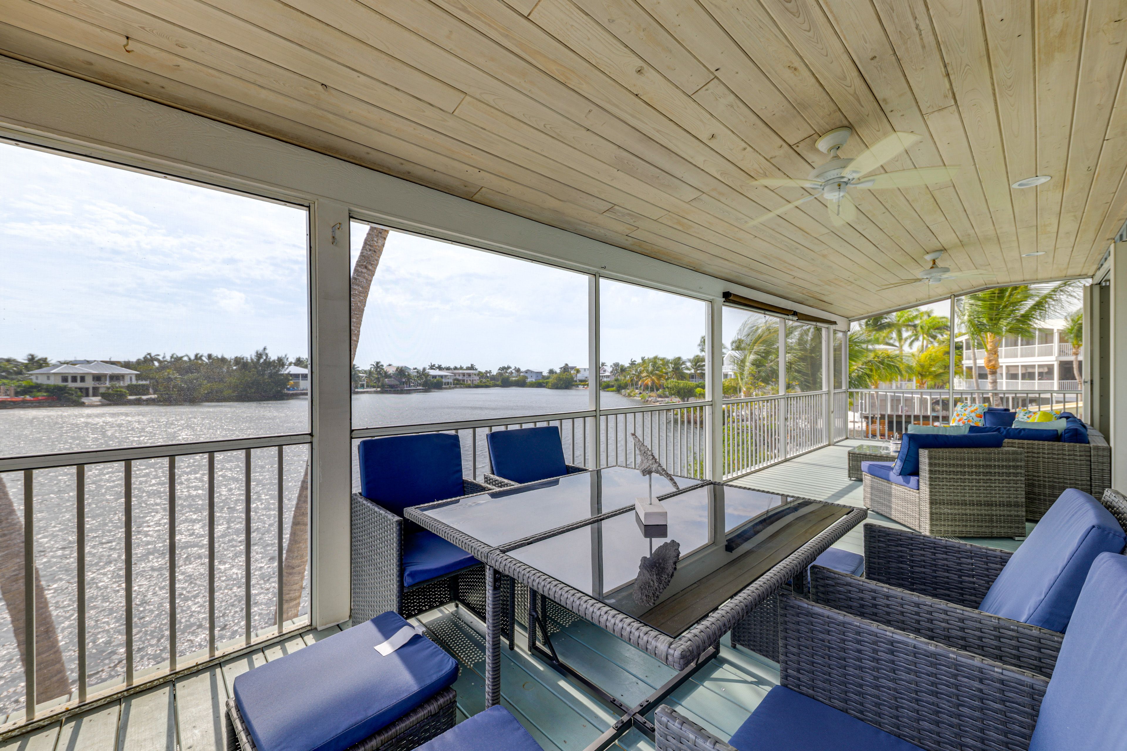 House Exterior | Screened Deck | Dining Area | Water Views