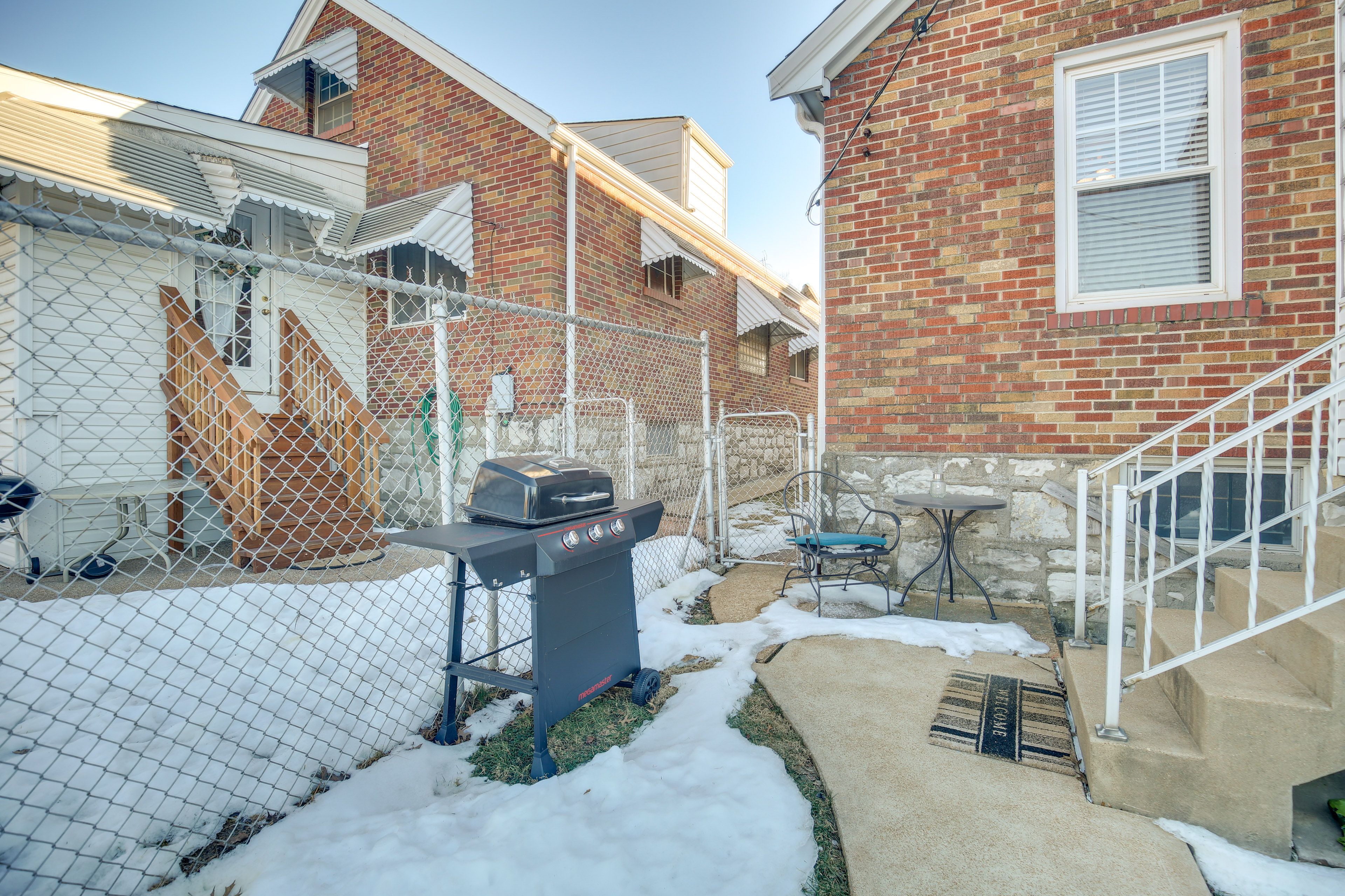 House Exterior | Gas Grill | Fenced Backyard