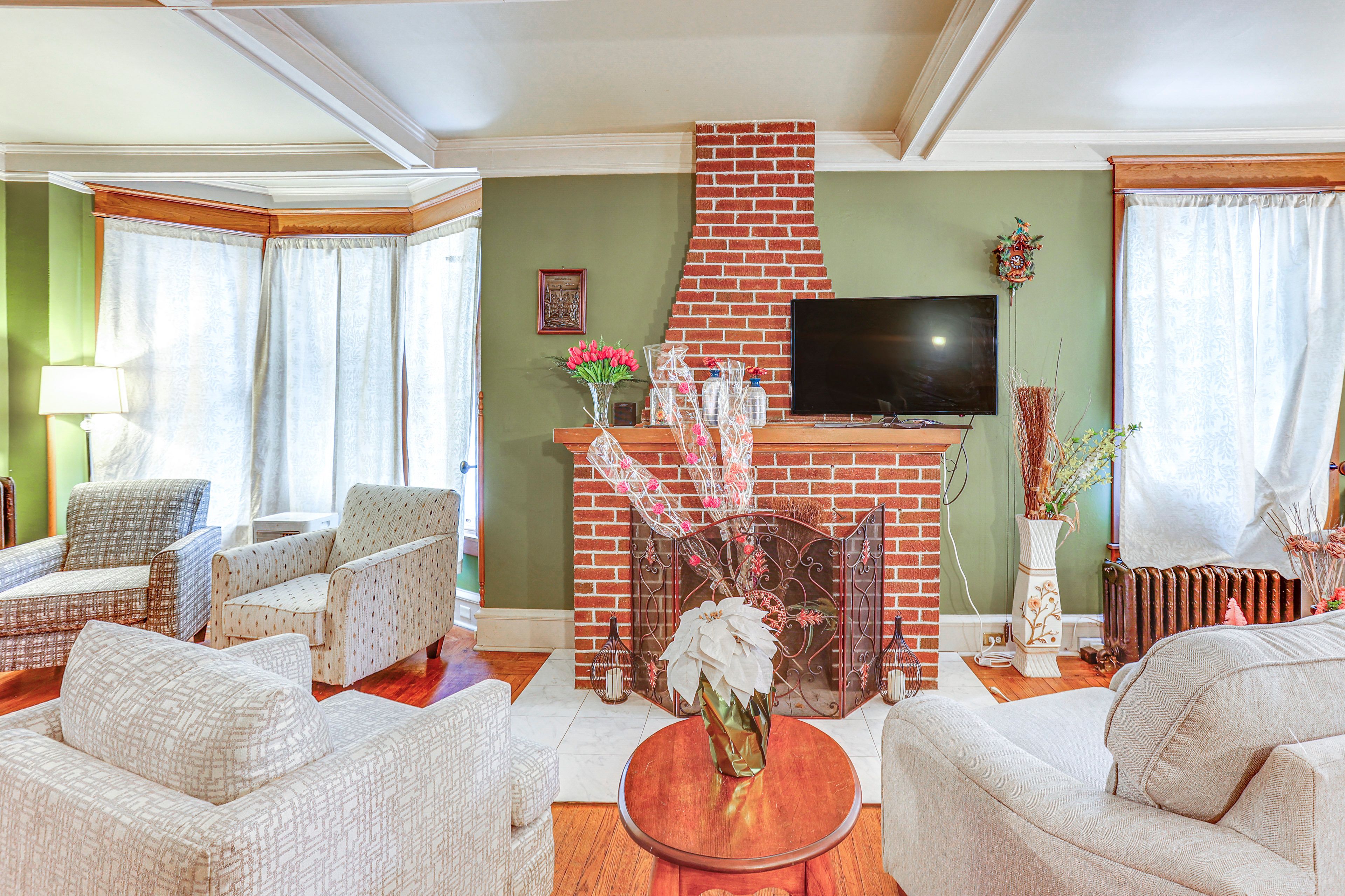 Living Room | Central Heating | Window A/C Units | Free WiFi | Fireplace