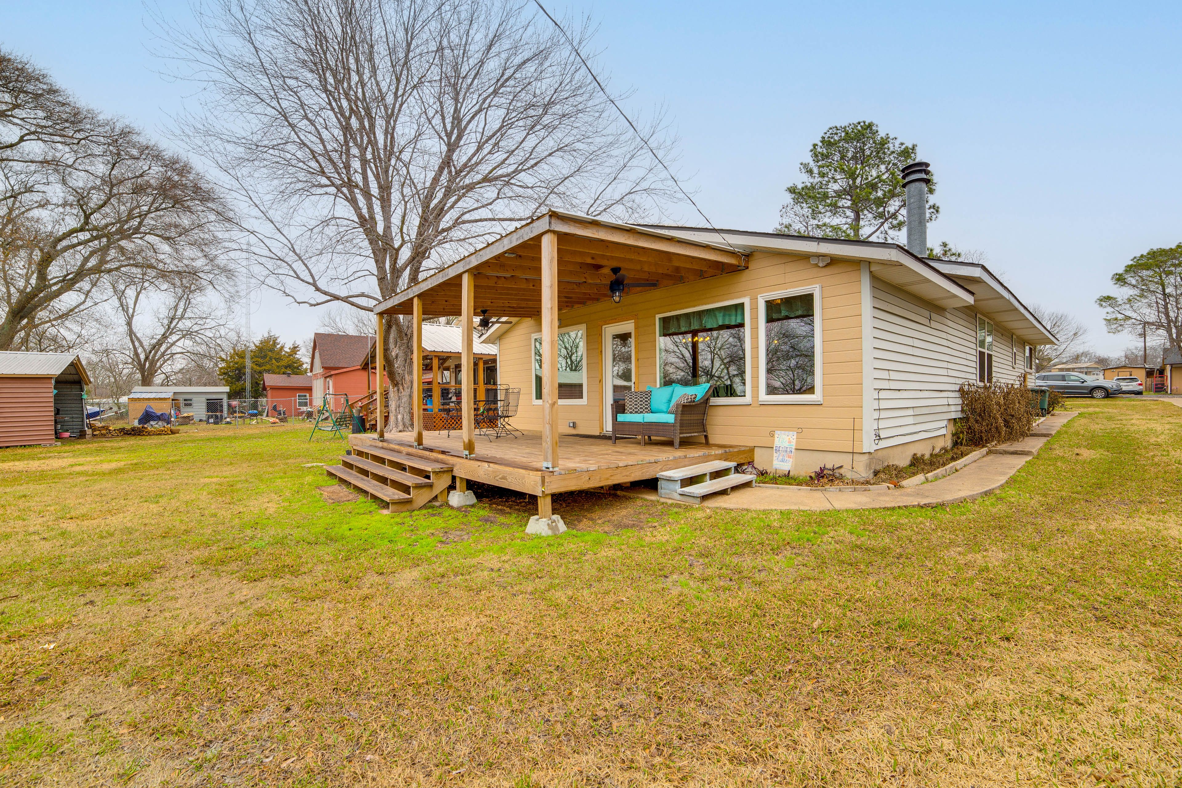 House Exterior | Furnished Deck | Dining Area | Charcoal Grill | Private Yard