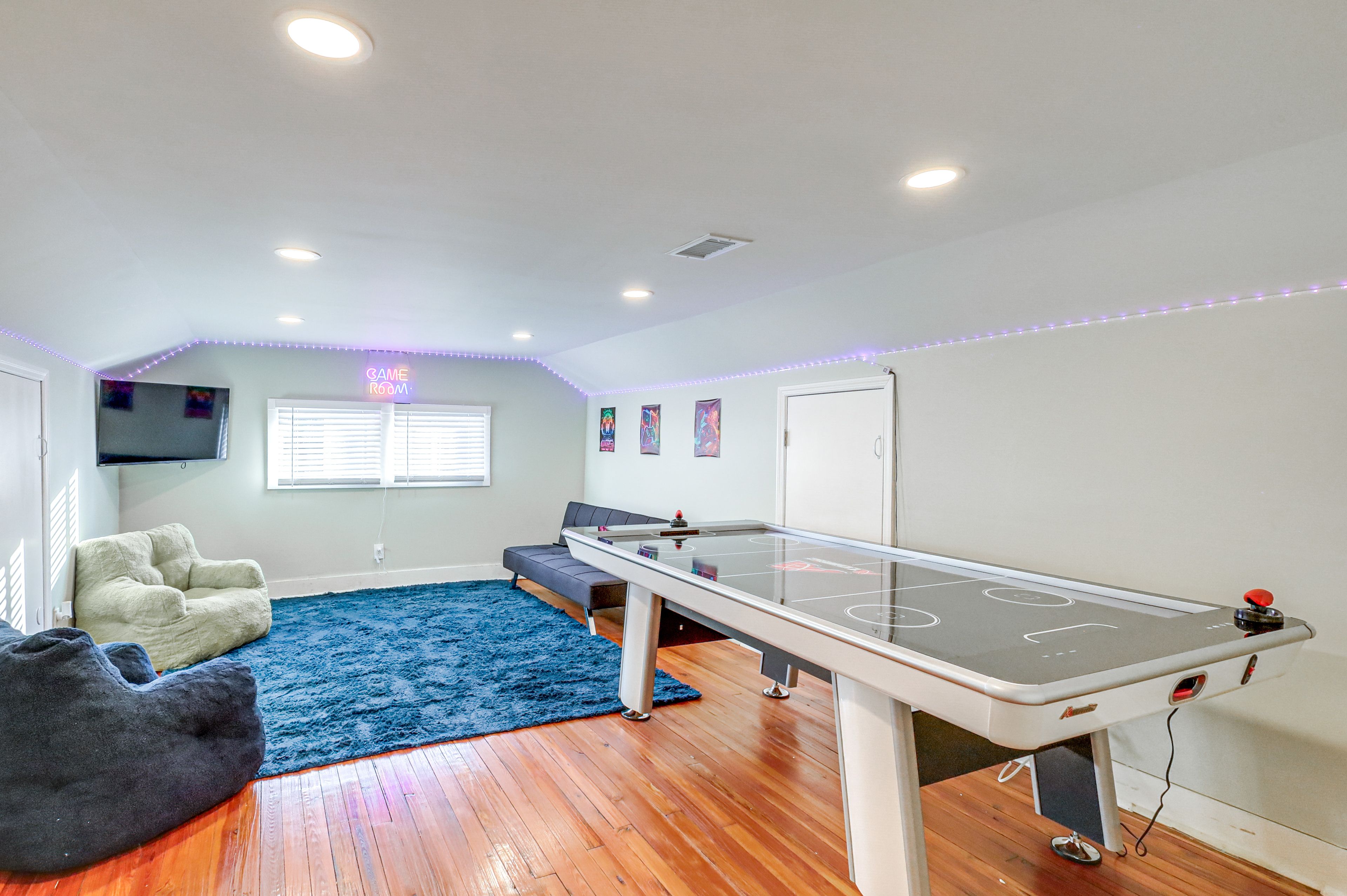 Den | 2nd Floor | Full Futon | Air Hockey Table | Smart TV