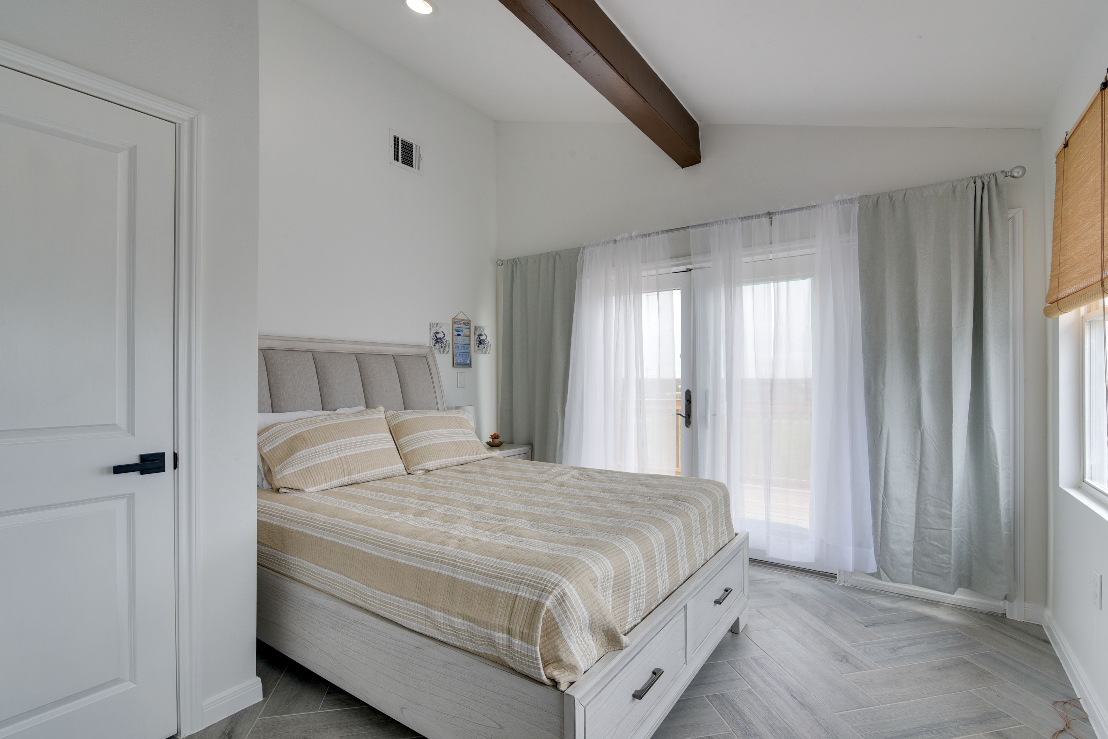 Bedroom 1 | Queen Bed | Linens Provided | Private Balcony Access