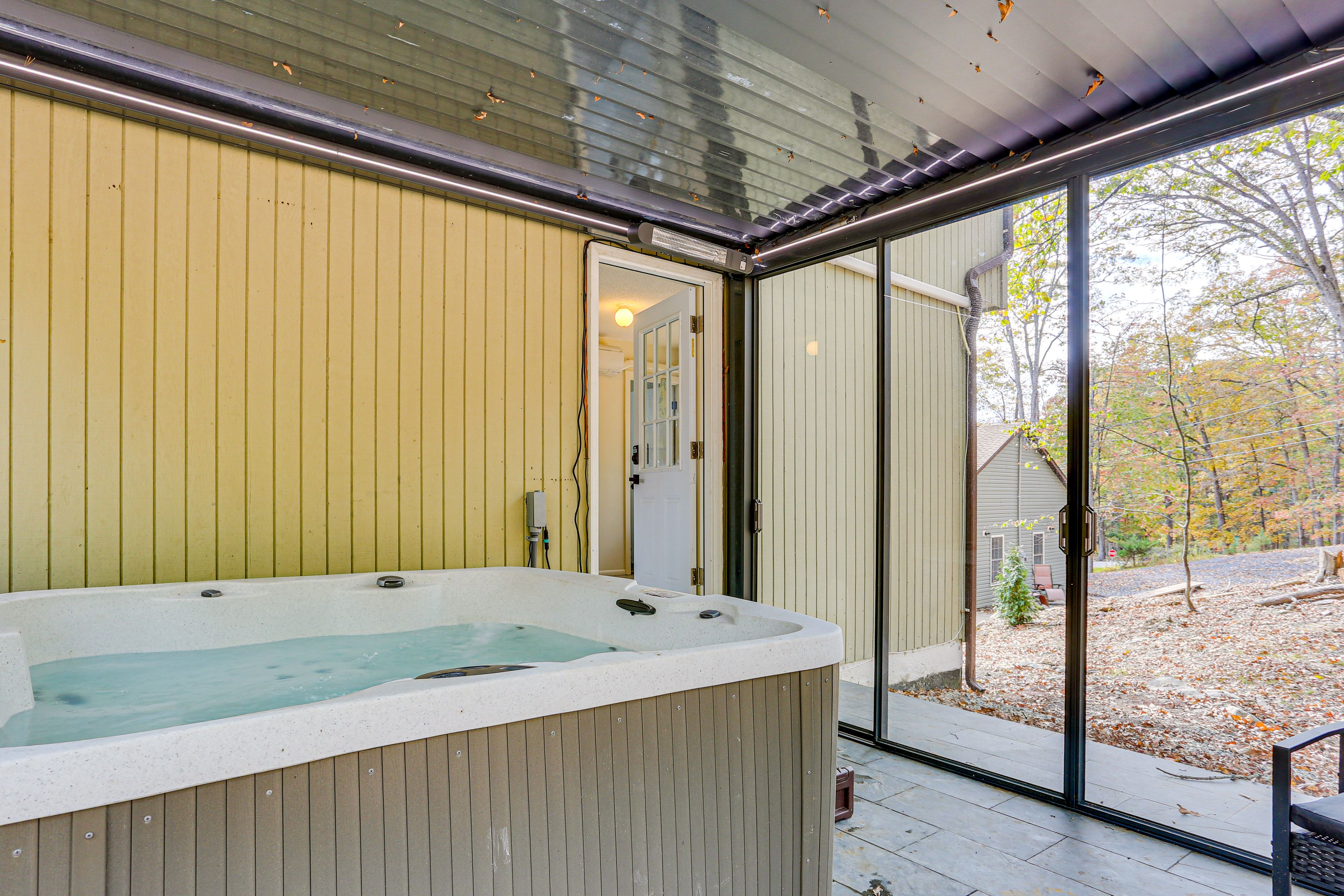 All-Season Glass Sunroom | Private 7-Person Hot Tub