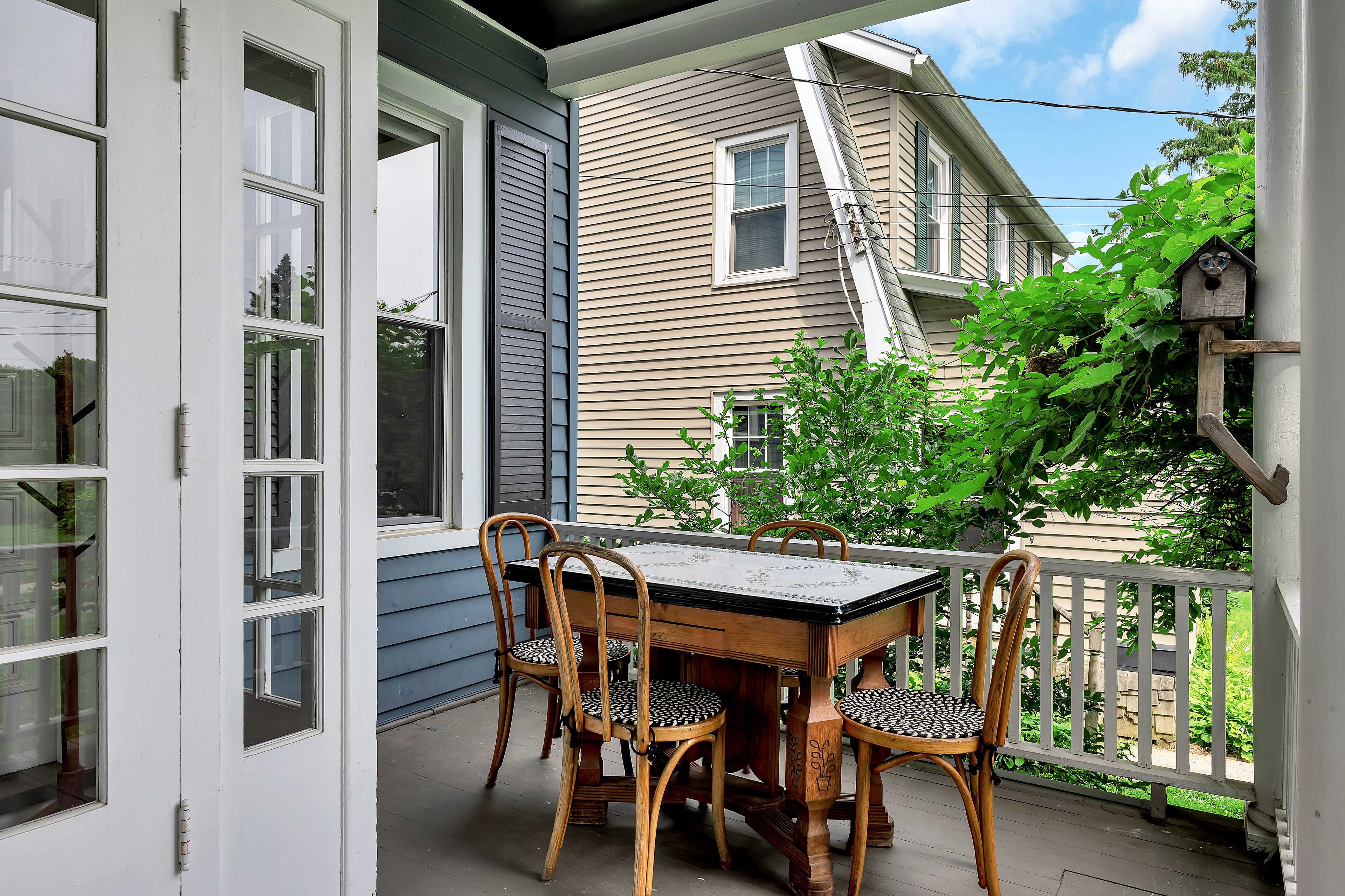 Covered Front Porch | Seating & Dining Area