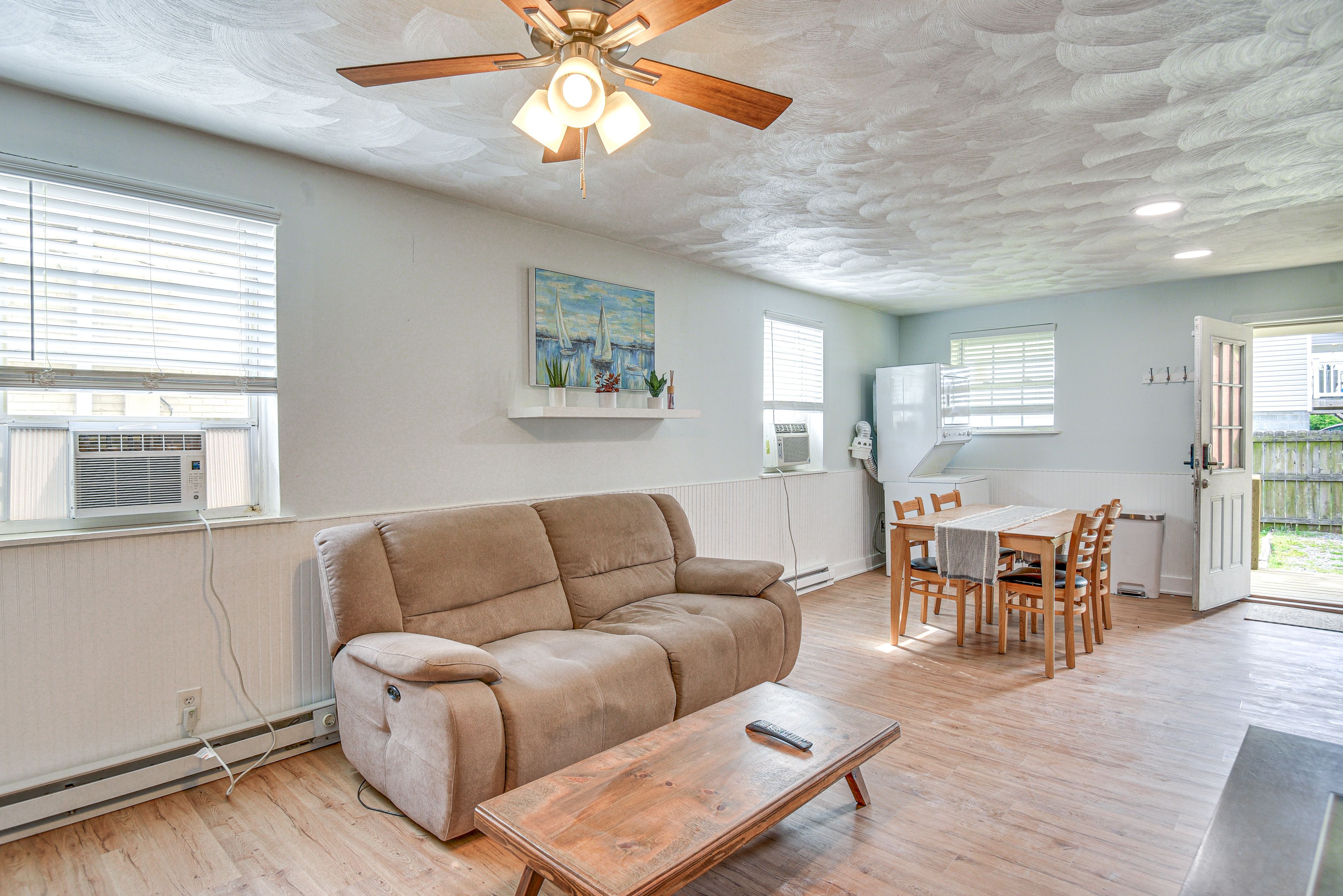 Living Room | Window A/C | Baseboard Heat | Free WiFi