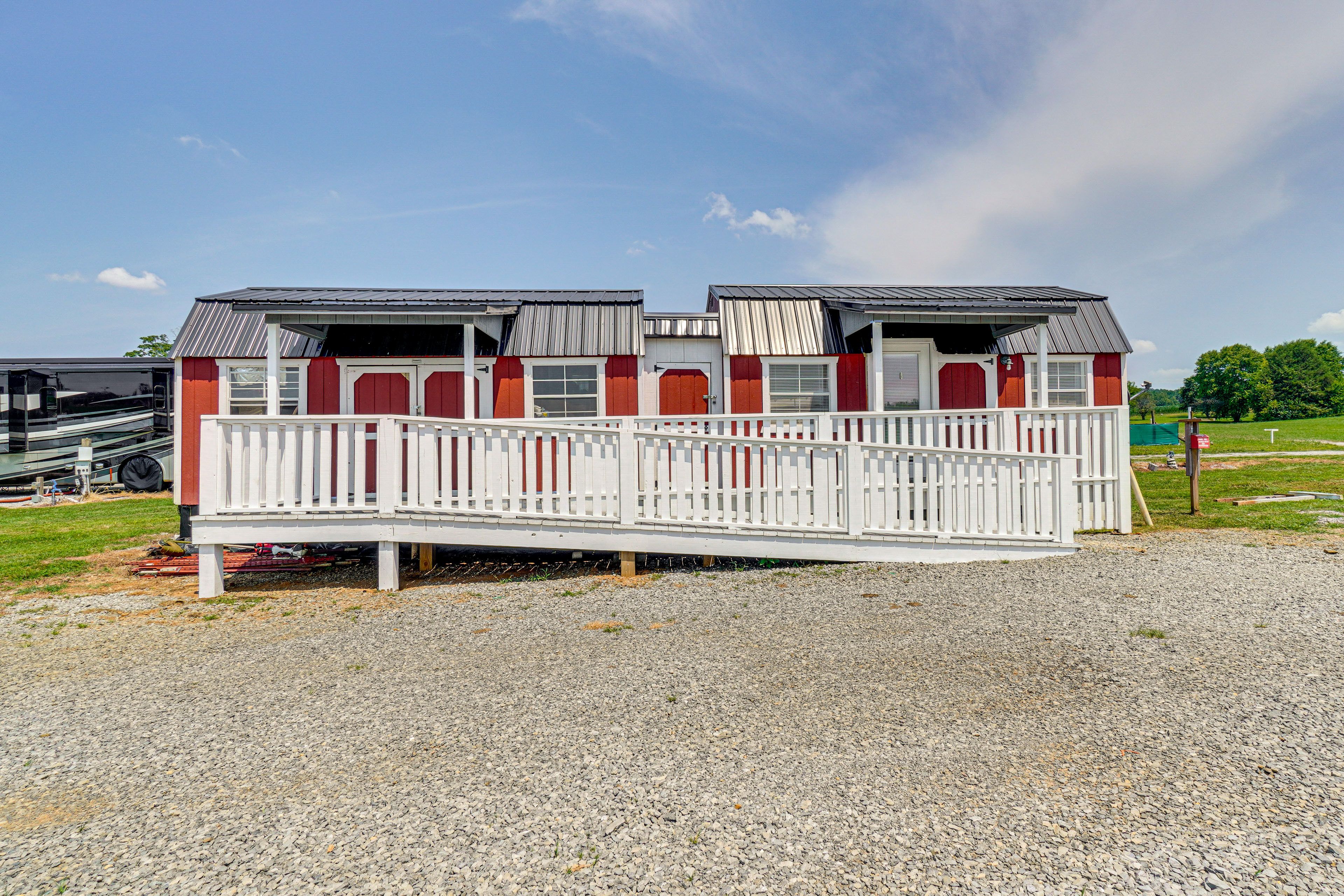 Property Exterior | Communal Charcoal Grills & Picnic Tables