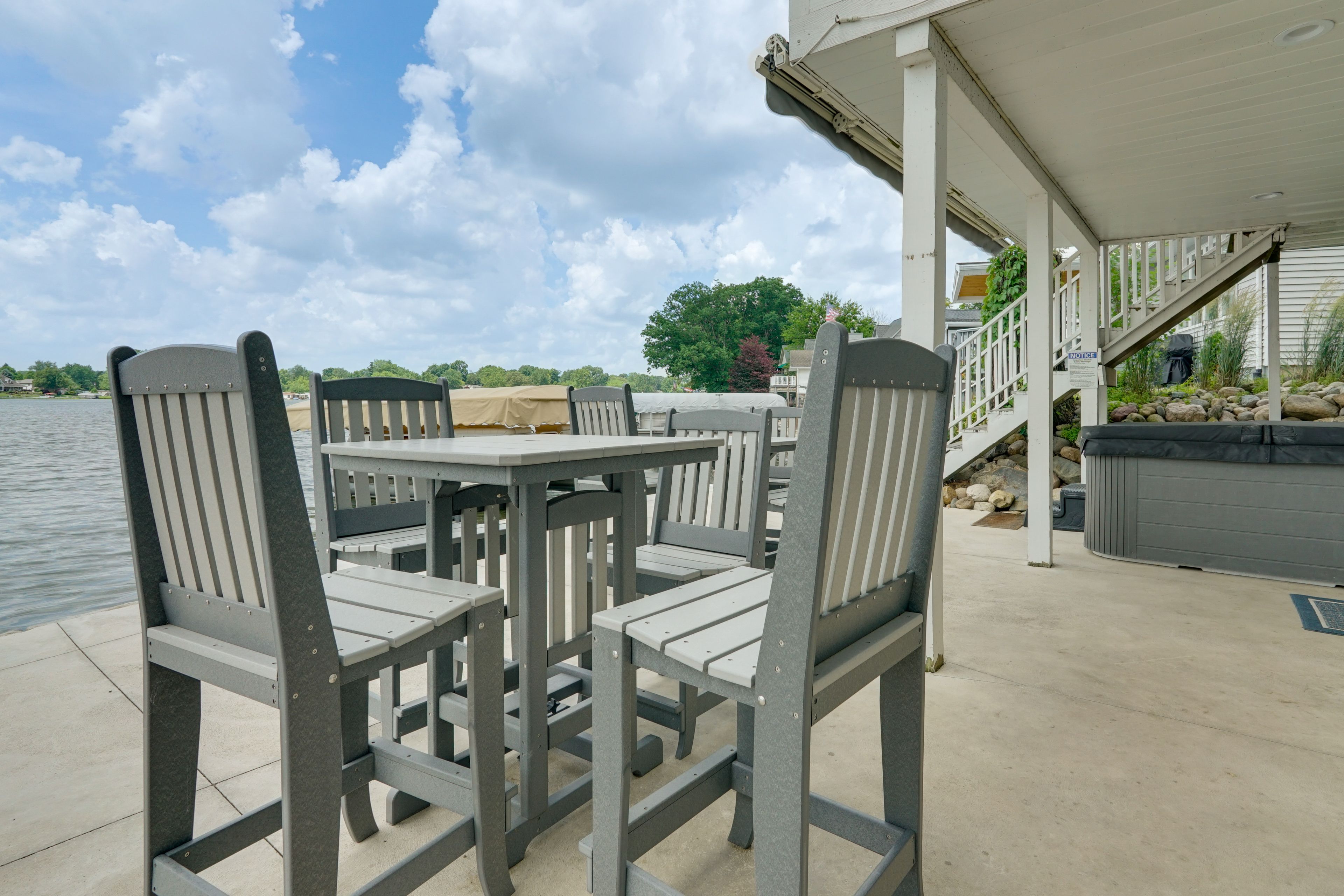 Private Patio | Hot Tub | Outdoor Dining Area | Lake Access