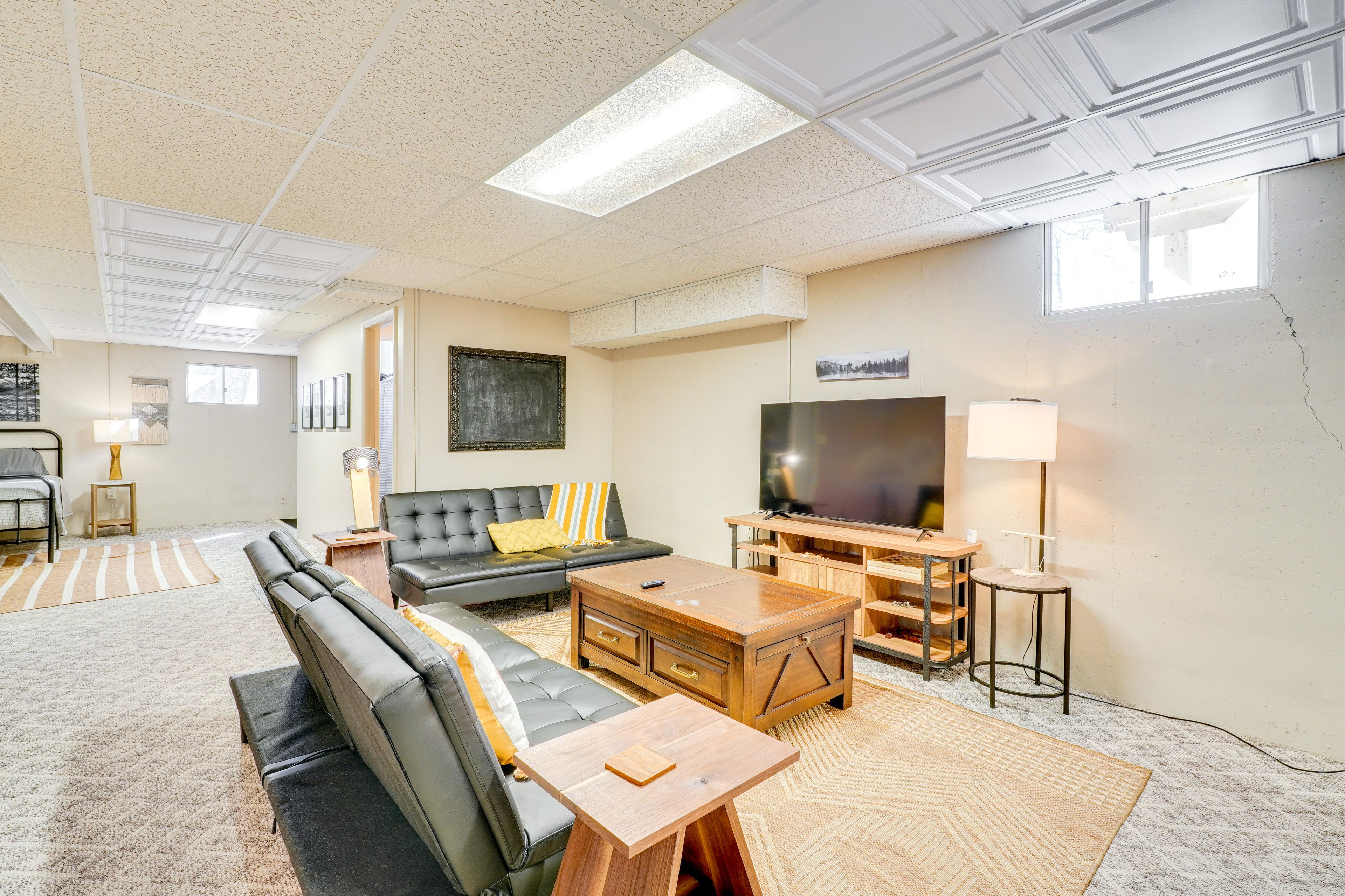 Basement Living Area | 2 Full Beds | 2 Twin Futons