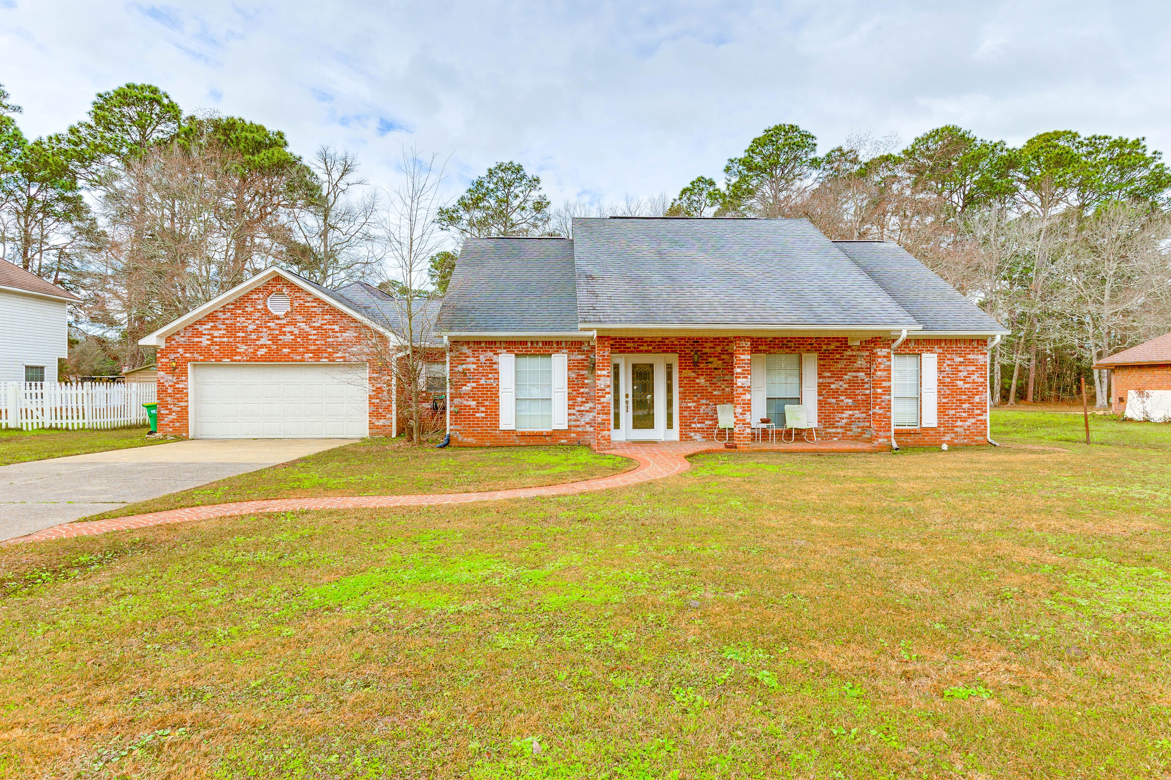 Property Exterior | Single-Story Home | Expansive Yard w/ Pond