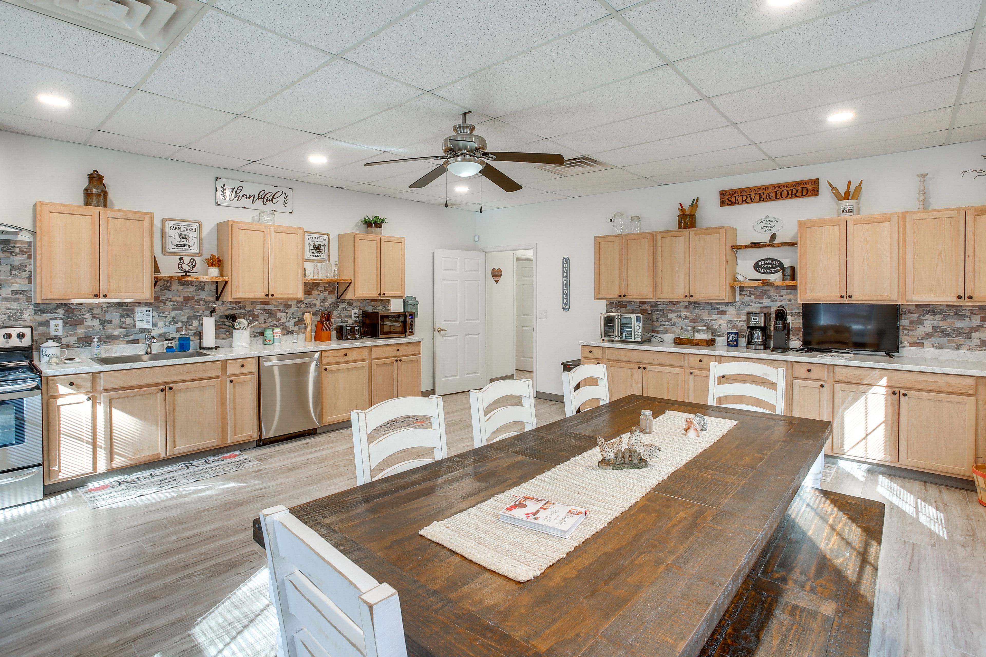 Kitchen & Dining Area | In-Unit Laundry | Central Heating & A/C