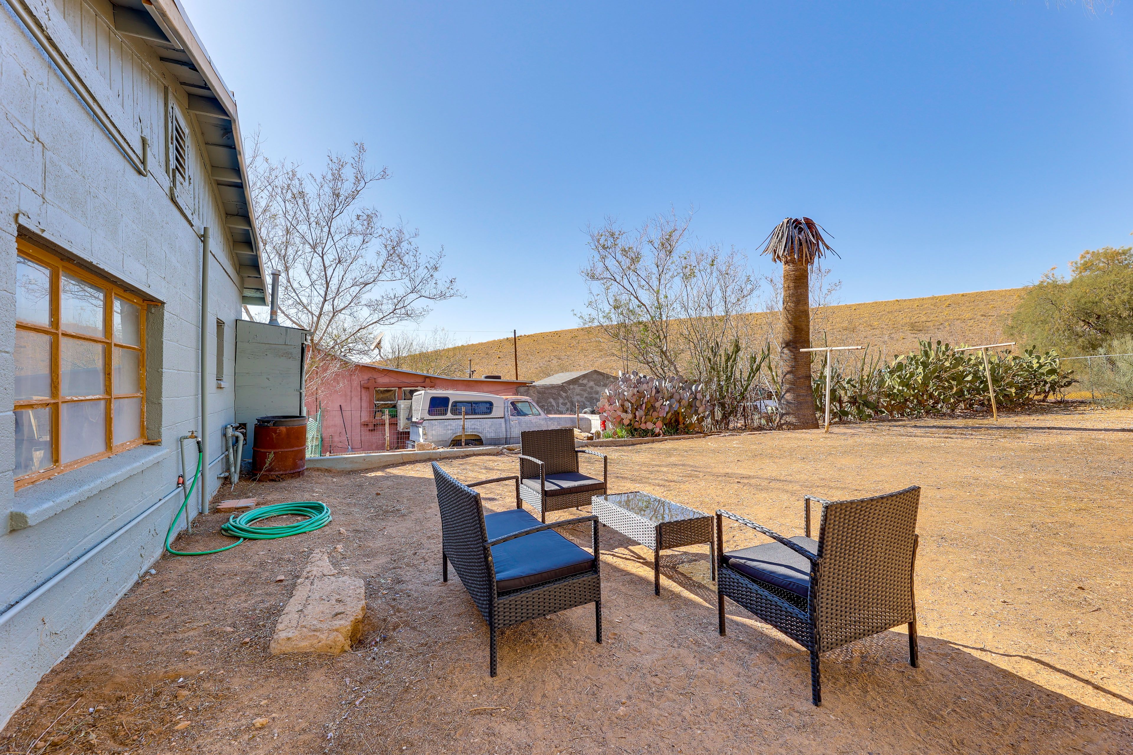 Private Backyard | Lounge Area | Charcoal Grill