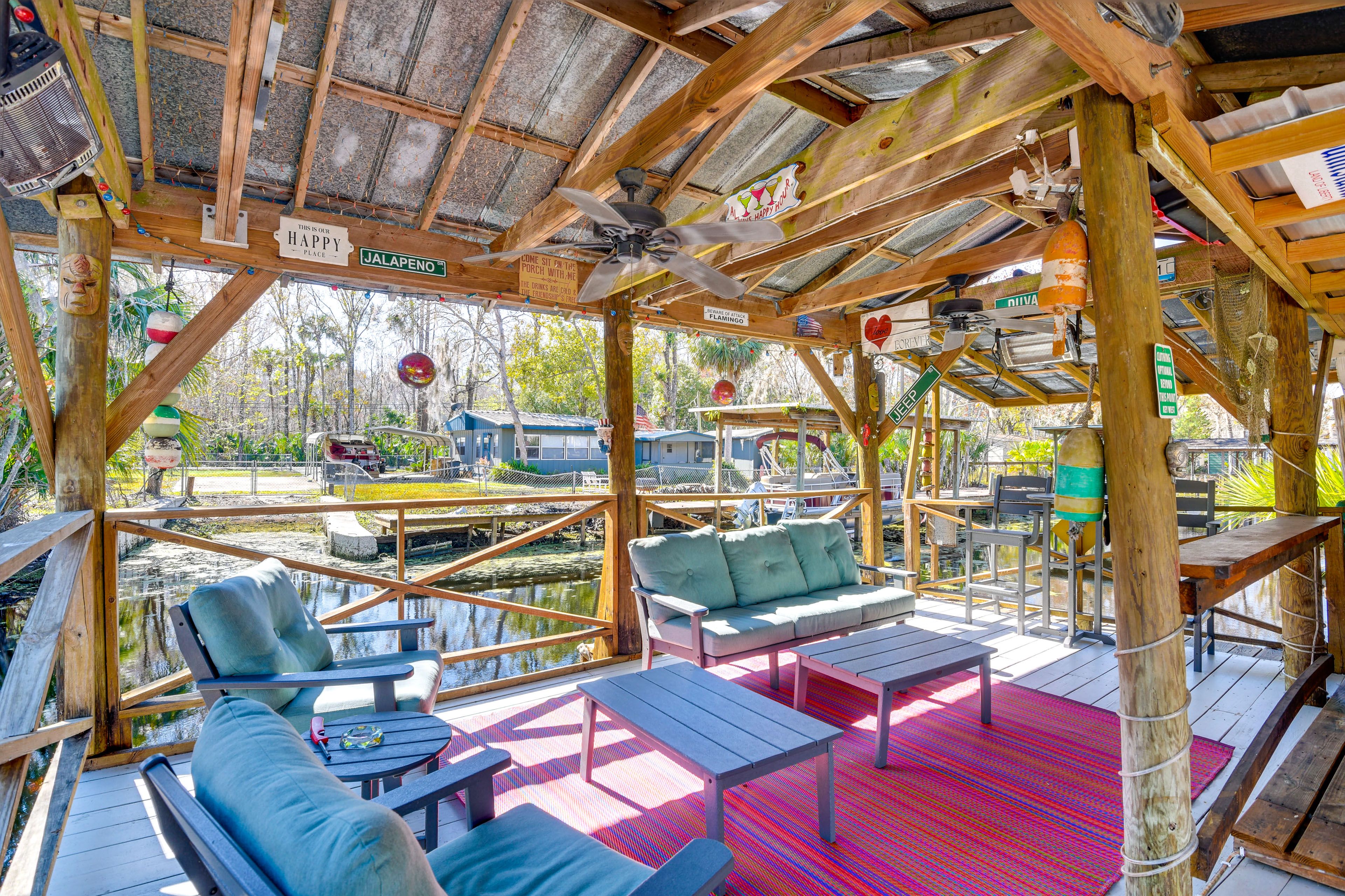 Covered Waterfront Deck | Seating | Canal View