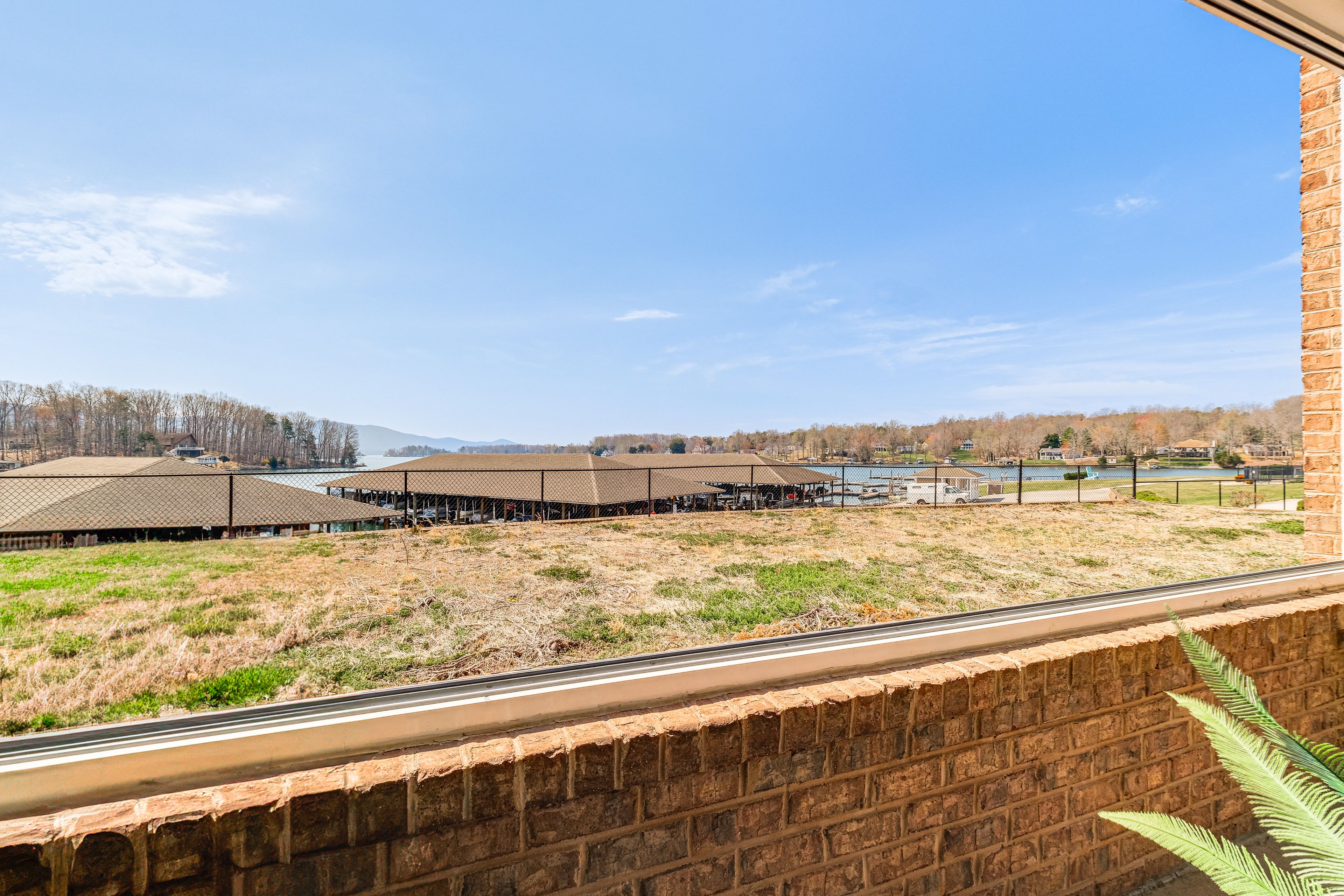 Enclosed Patio | Lake & Mountain Views | Access From Living Room