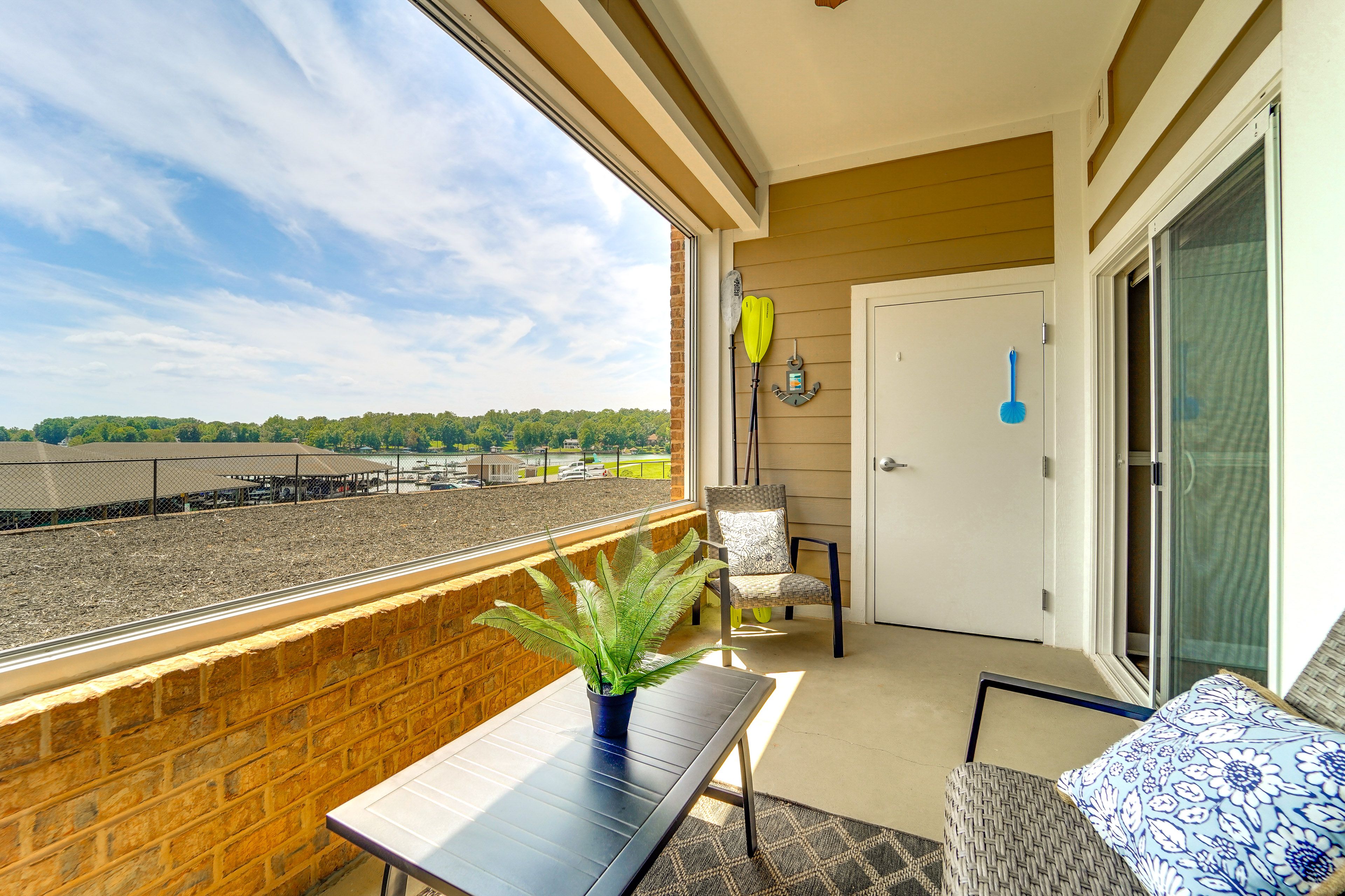 Enclosed Patio | Lake & Mountain Views | Access From Living Room