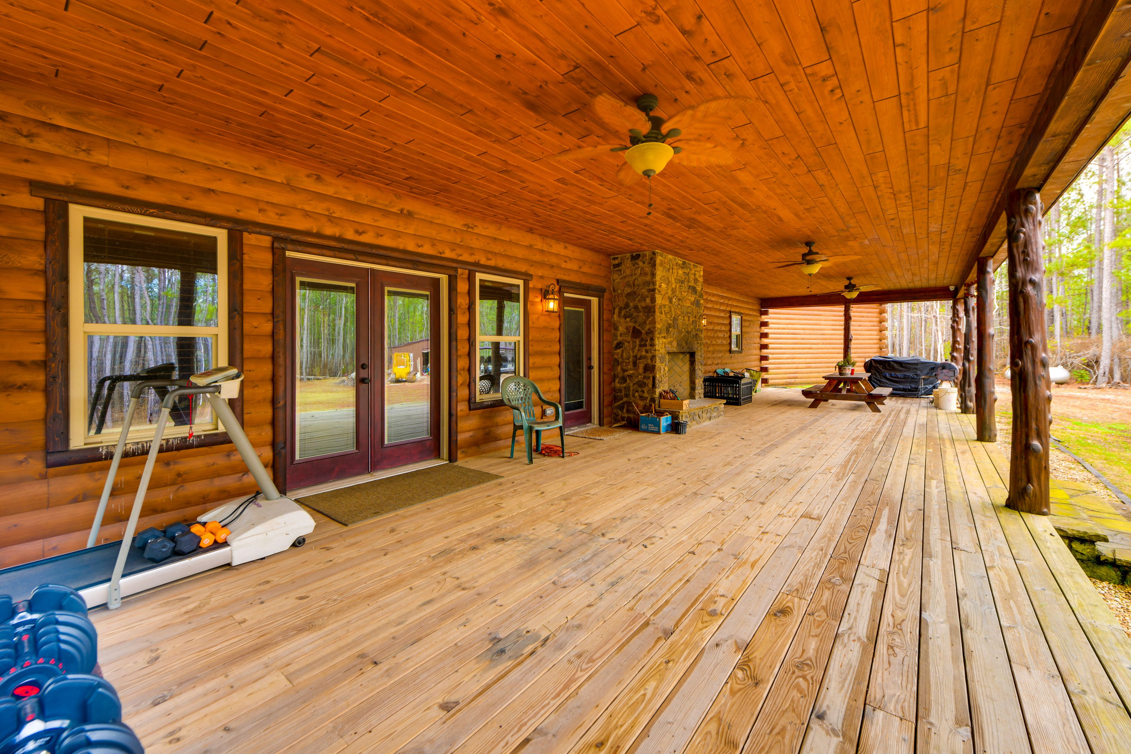 House Exterior | Wraparound Deck | Treadmill | Free Weights | Fireplace