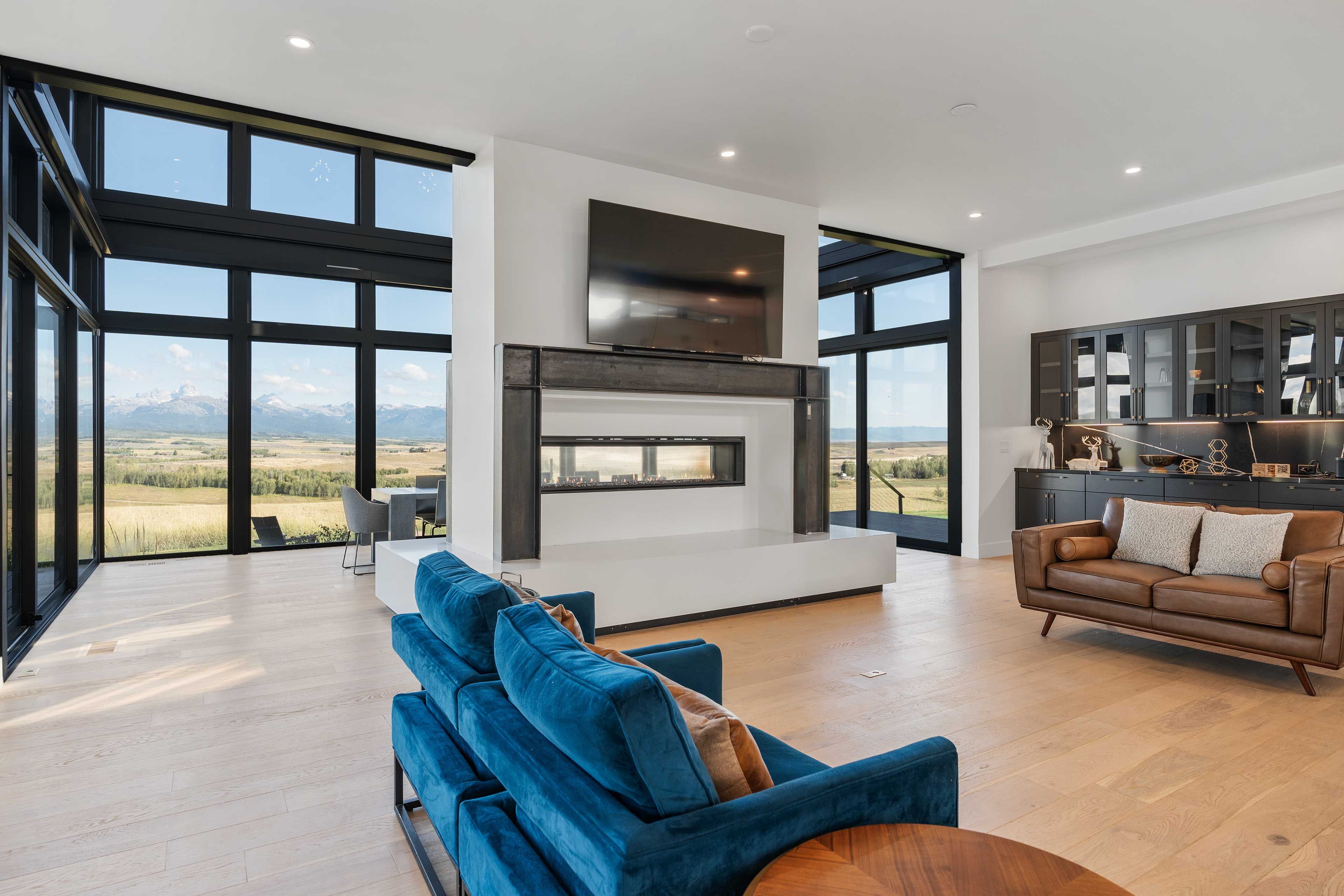 Living Room | 1st Floor | Books/Board Games | Fireplaces