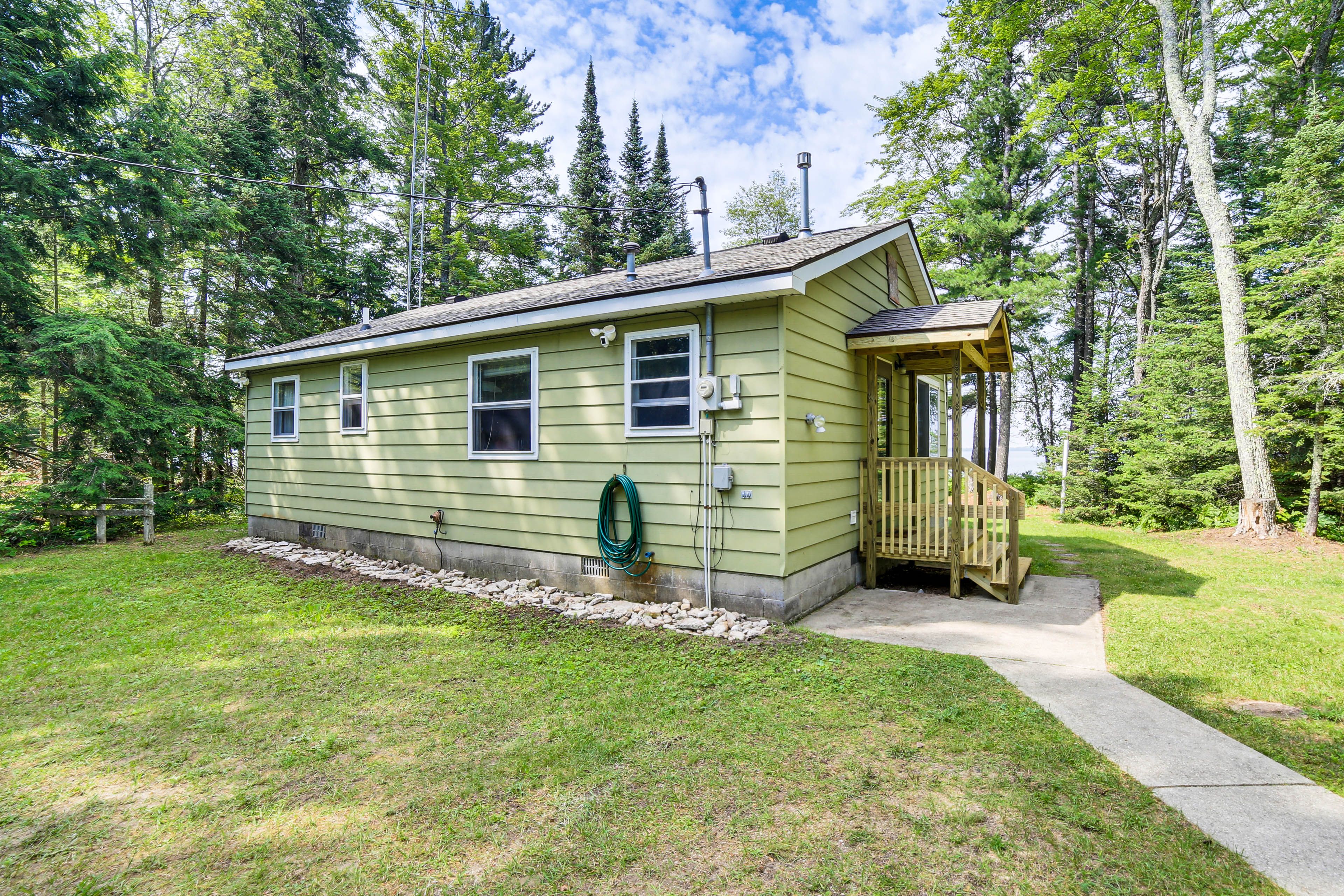 Property Exterior | Designated Grass Area (4 Vehicles)