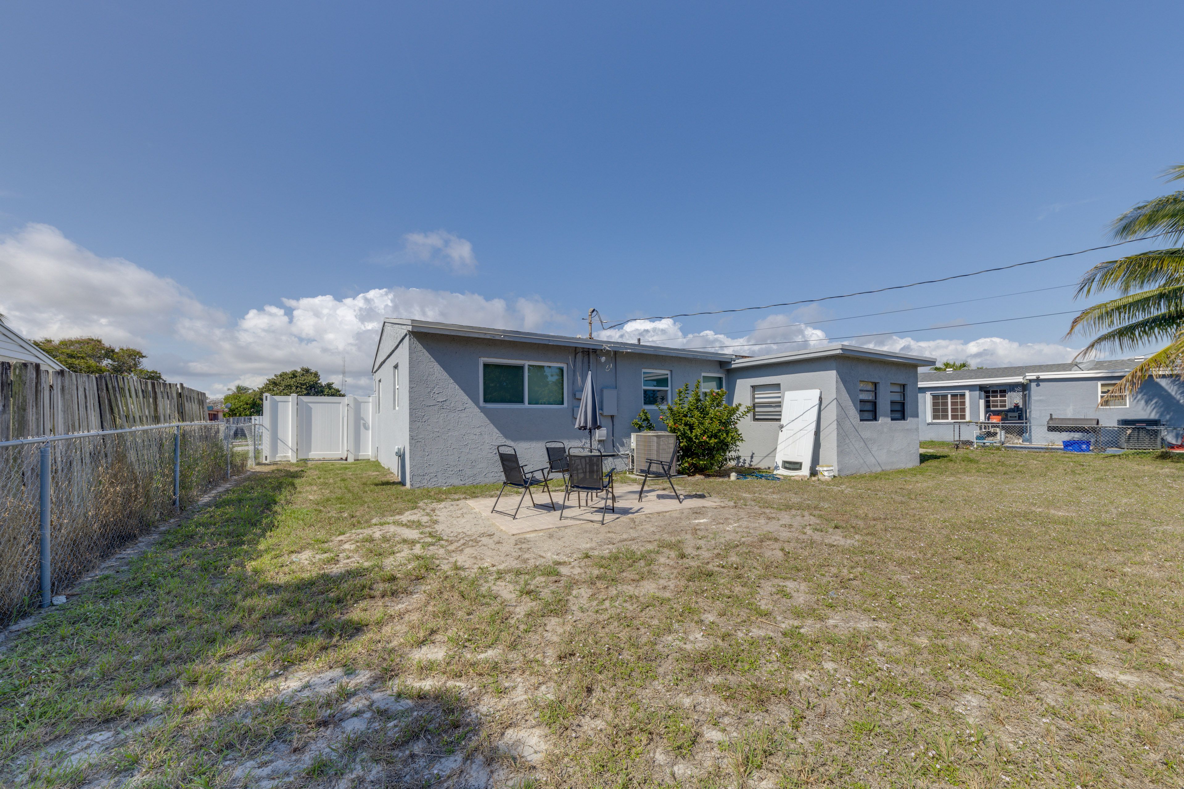 House Exterior | Furnished Patio | Dining Area | Fenced Backyard