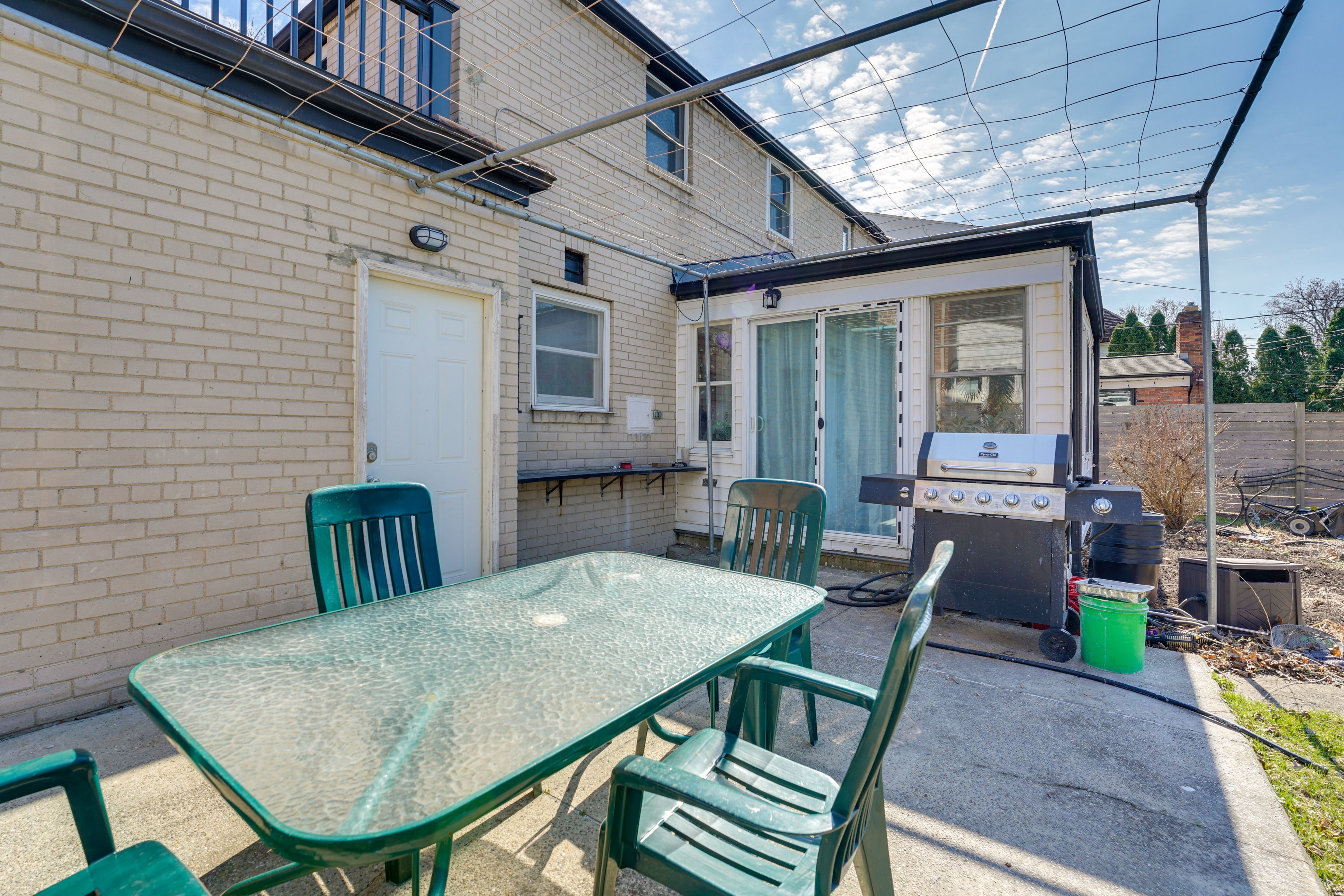 Patio | Gas Grill | Outdoor Dining Area | Fenced Backyard