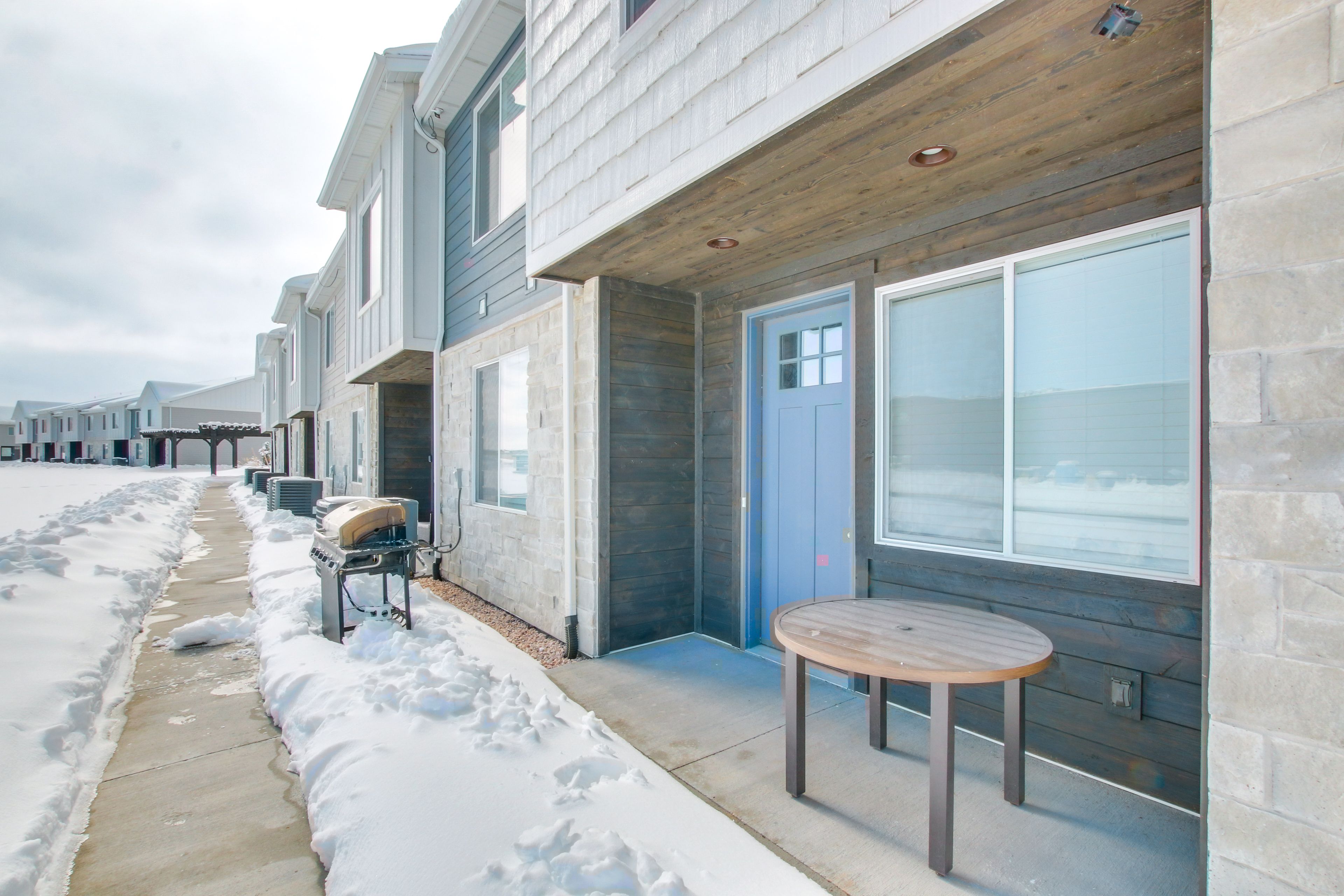 Front Exterior | Gas Grill | Mountain & Lake Views