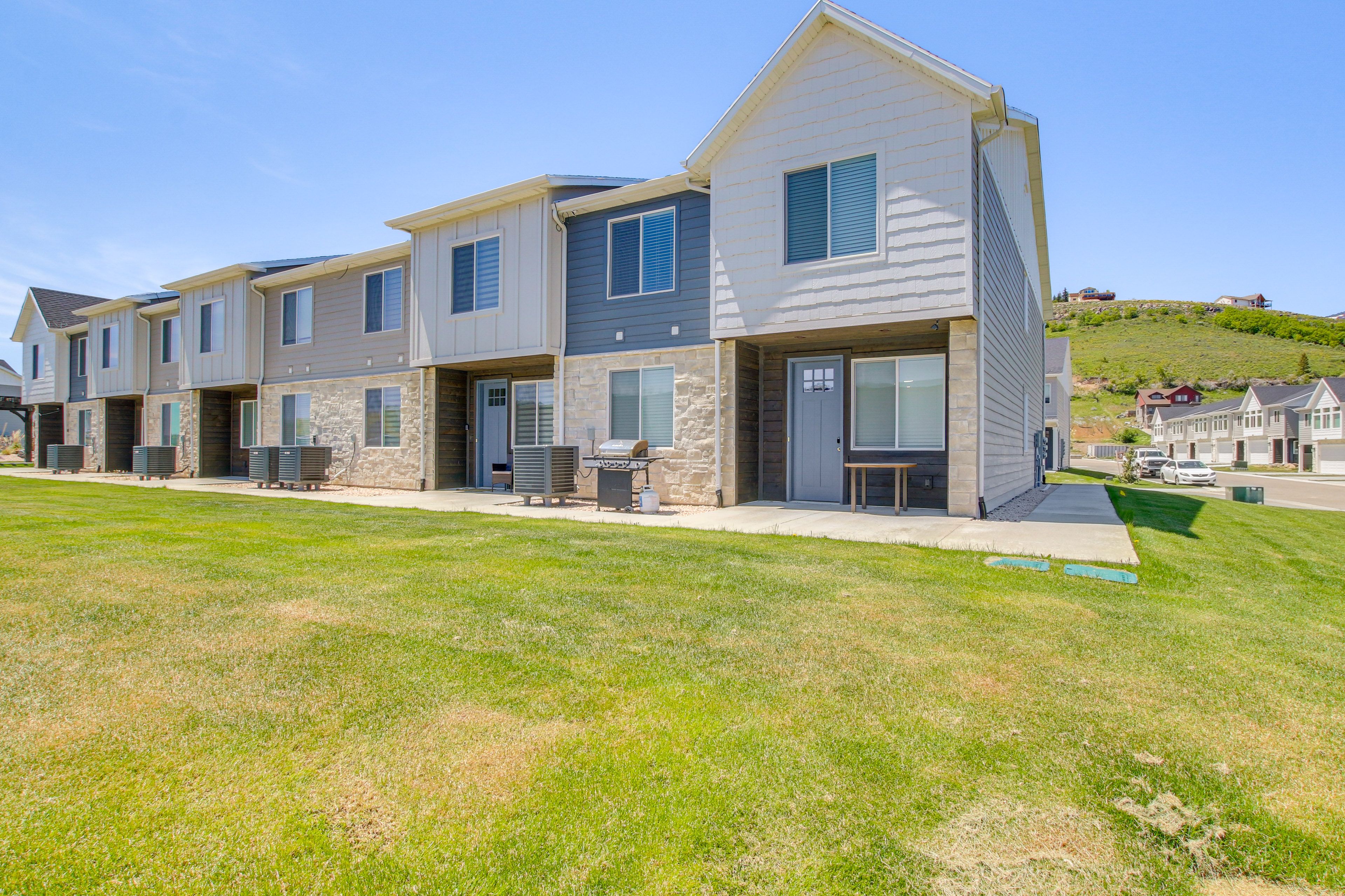 Front Exterior | Gas Grill | Mountain & Lake Views