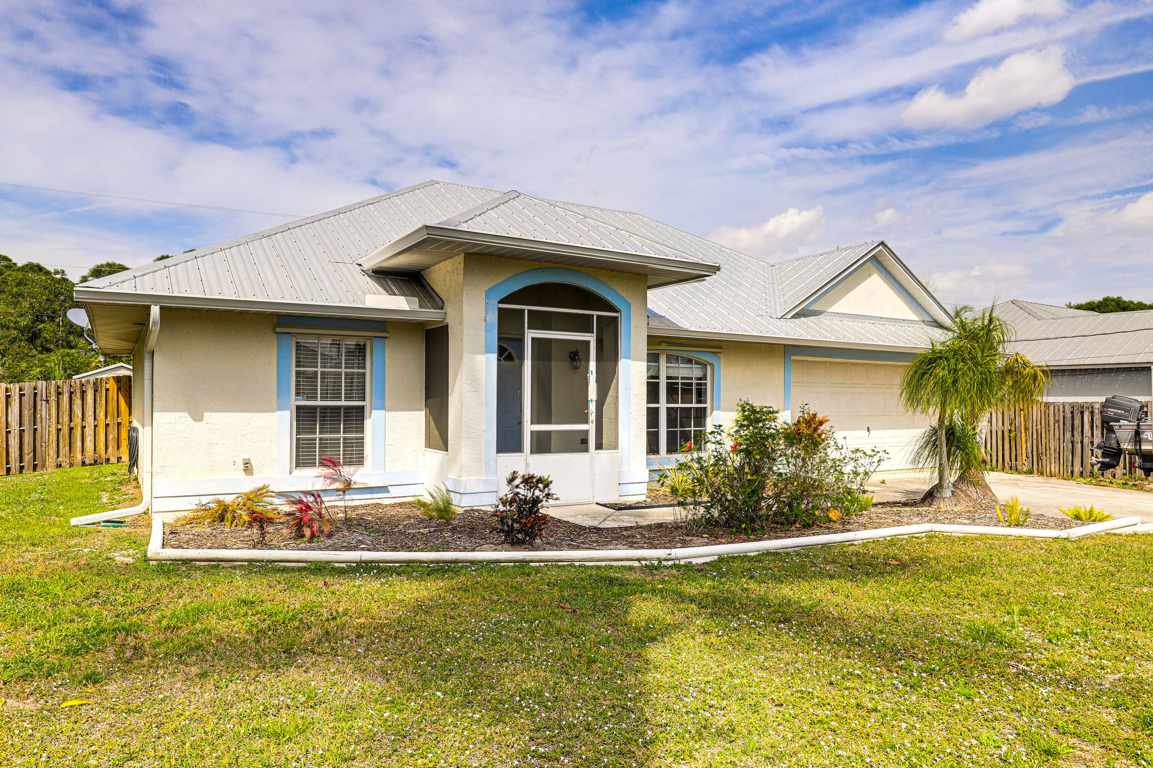 Property Exterior | Single-Story Home | Screened-In Pool