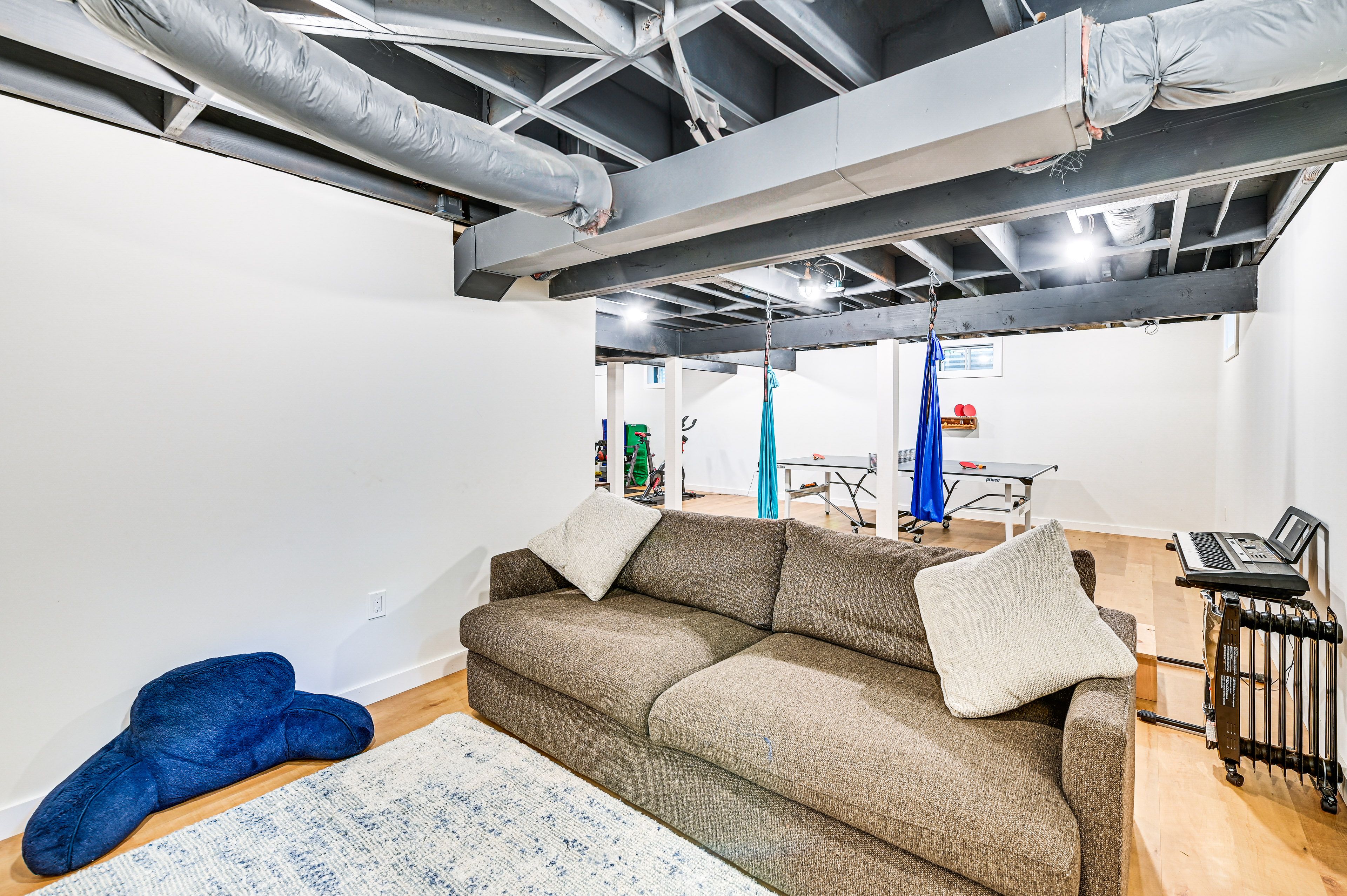 Family Room | Smart TV | Electric Piano | Ping-Pong Table | 1st Floor