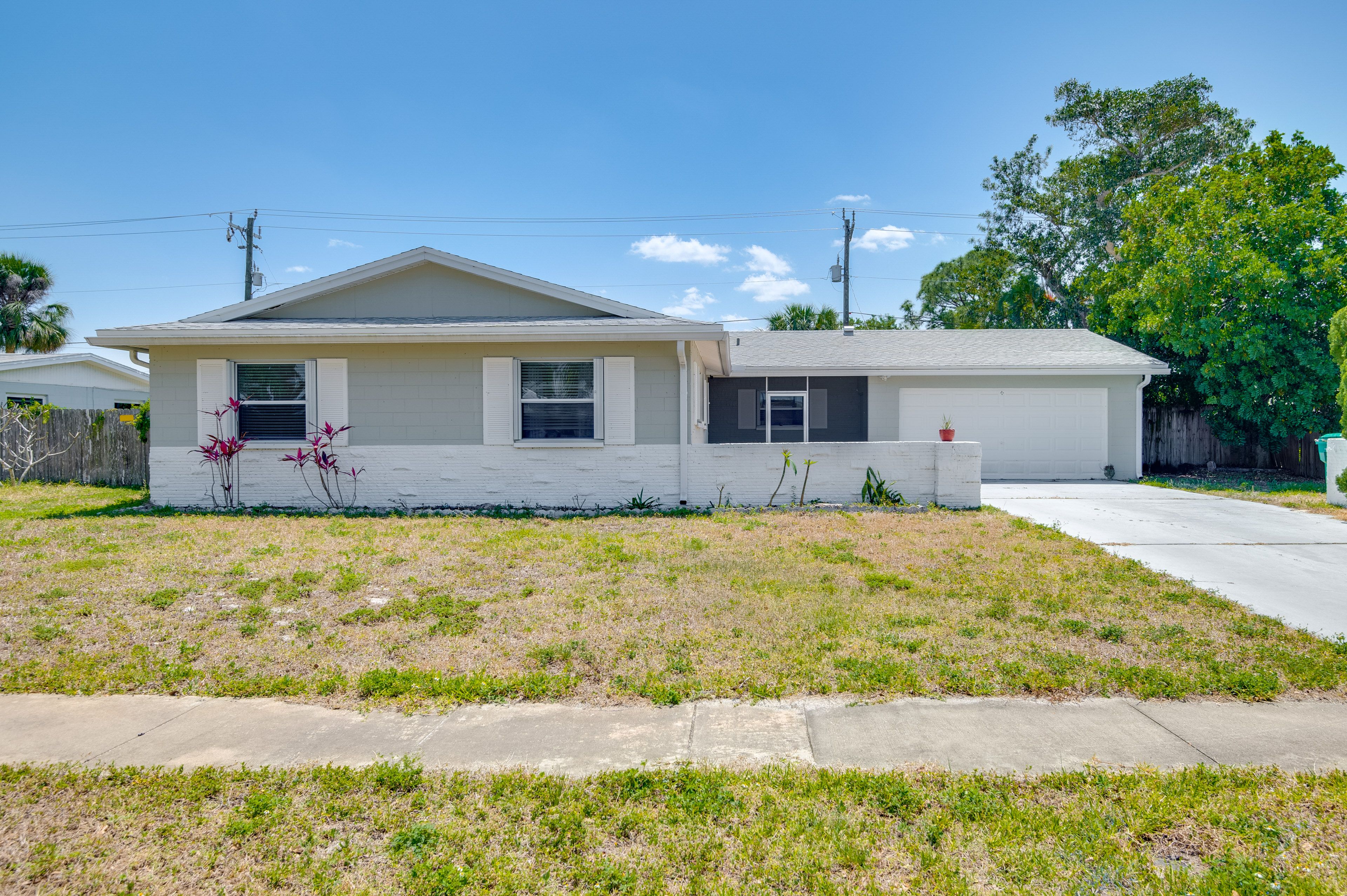 Property Exterior | Fenced Yard | Screened-In Lanai | Private Pool