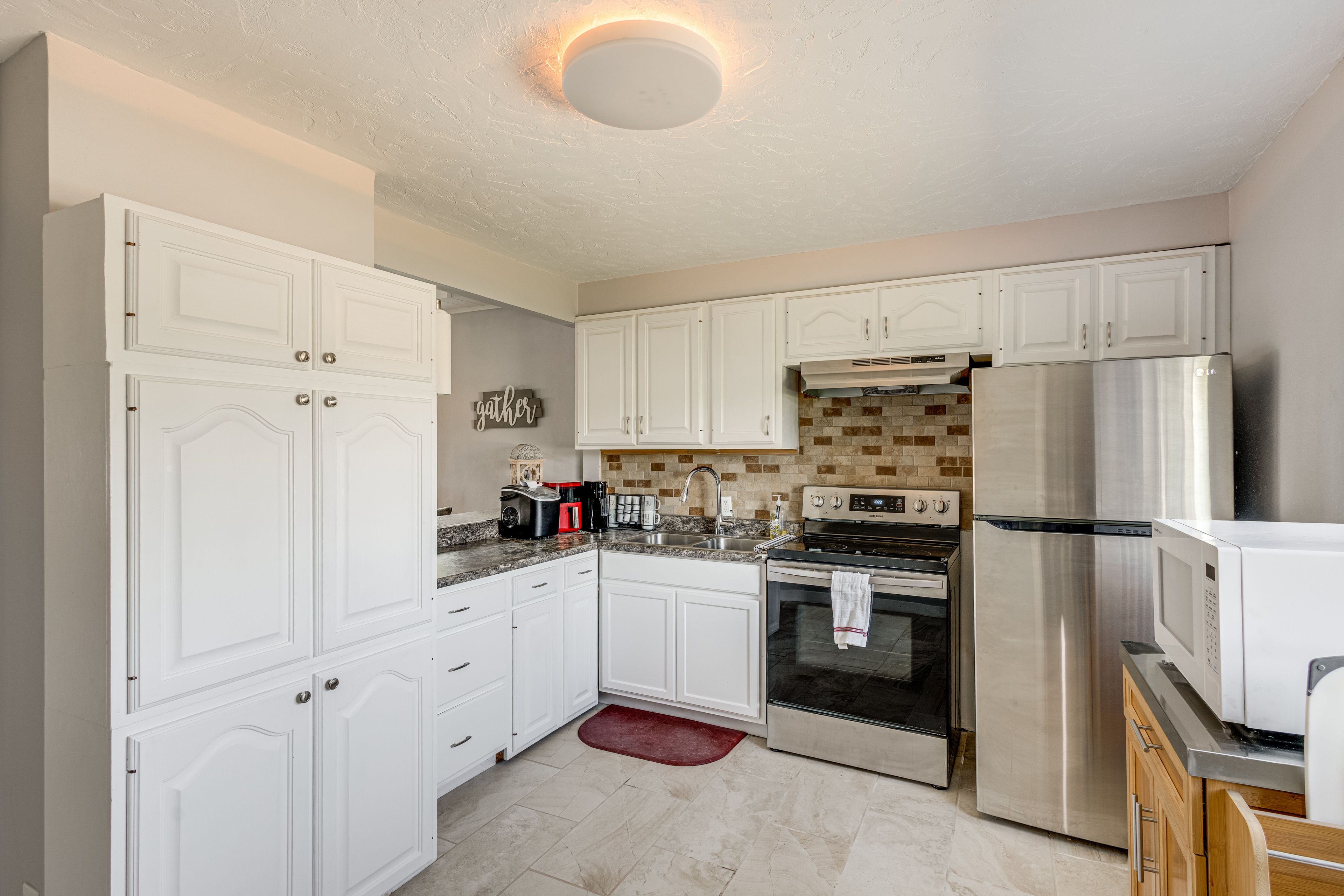Kitchen | Single-Story Home | Free WiFi | Window A/C Units & Central Heating