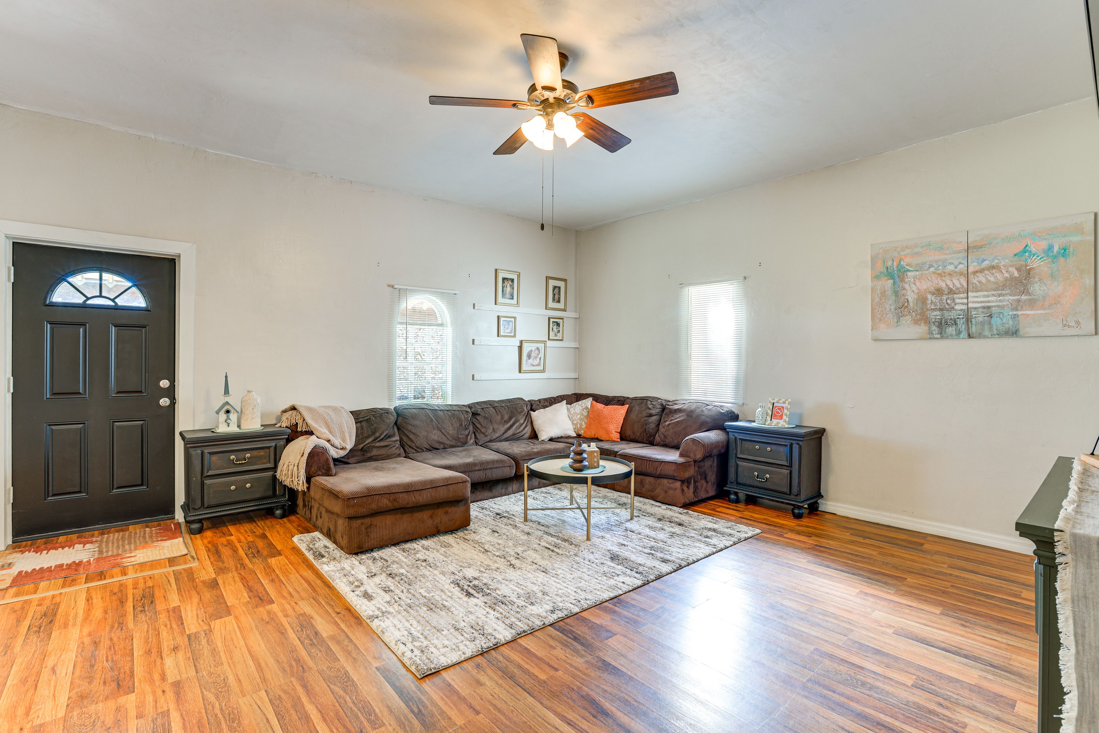 Living Room | TV | A/C Unit | Single-Story Home