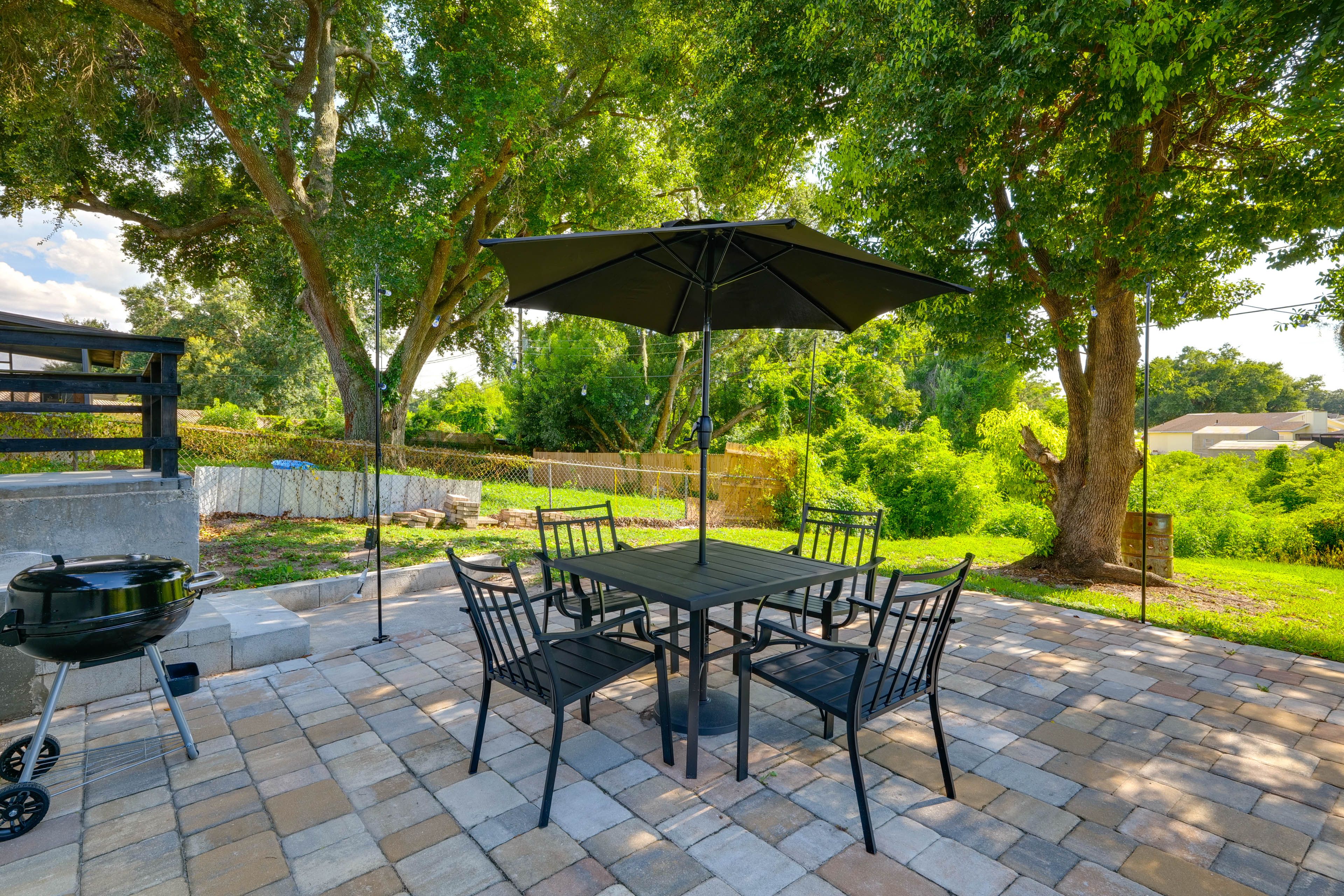 Uncovered & Covered Patios | Grassy Yard | Single-Story Home