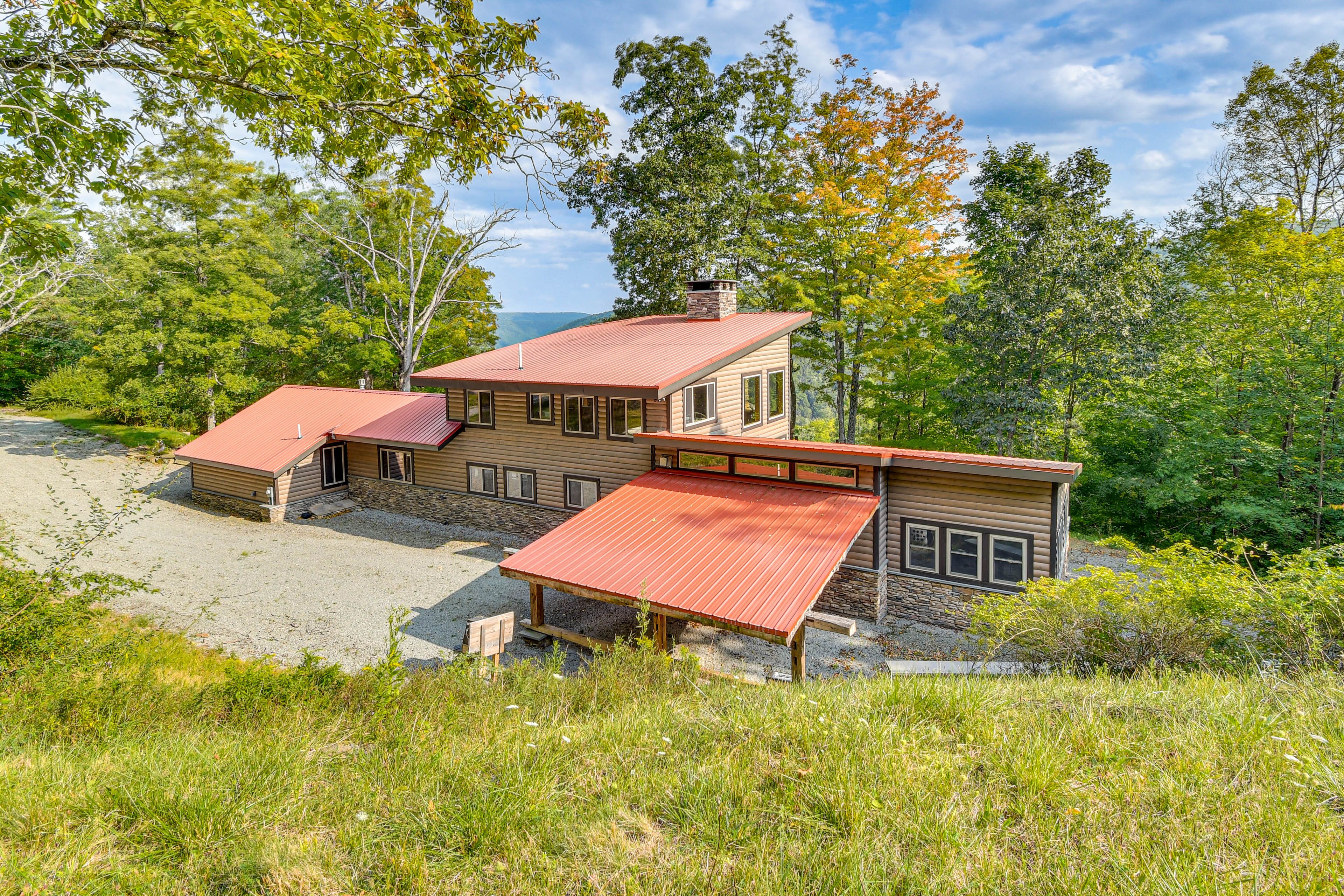 Main Cabin Exterior | Gravel Driveway Parking (11 Vehicles) | RV/Trailer Parking