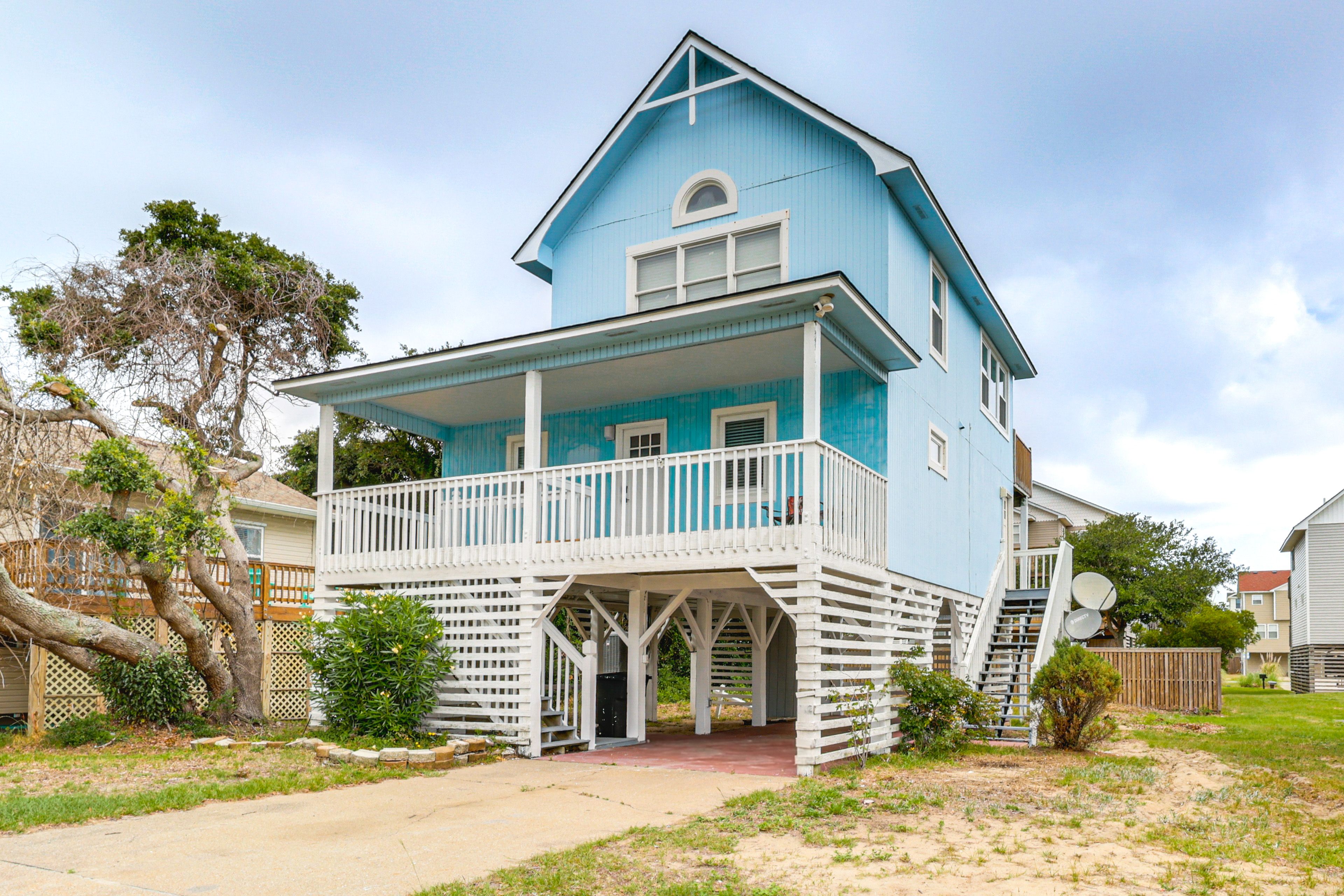 Property Exterior | Stilted 2-Story Home | Outdoor Shower
