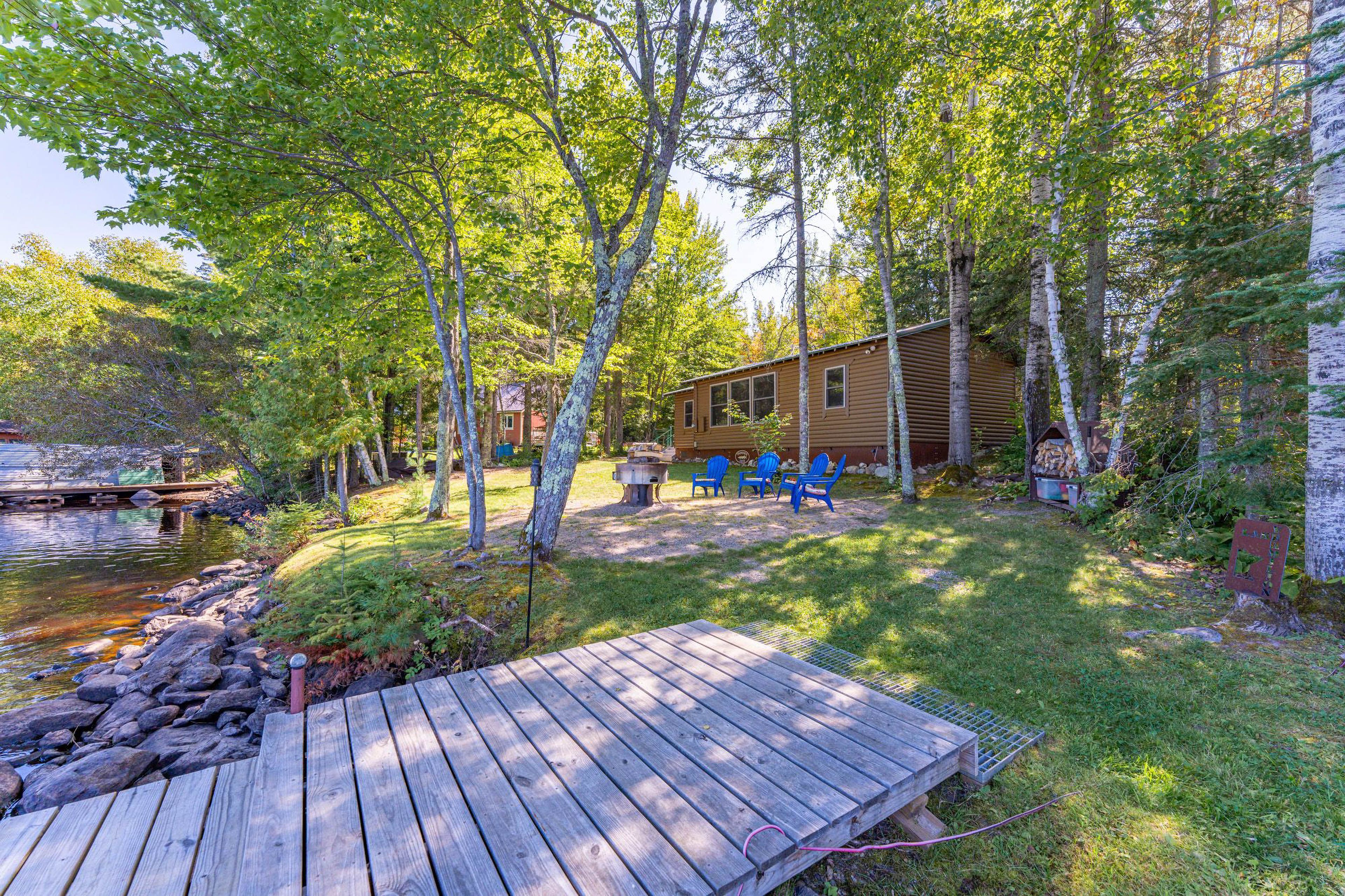 Cabin Exterior | Fire Pit/Pizza Oven | Seasonal Boat Dock