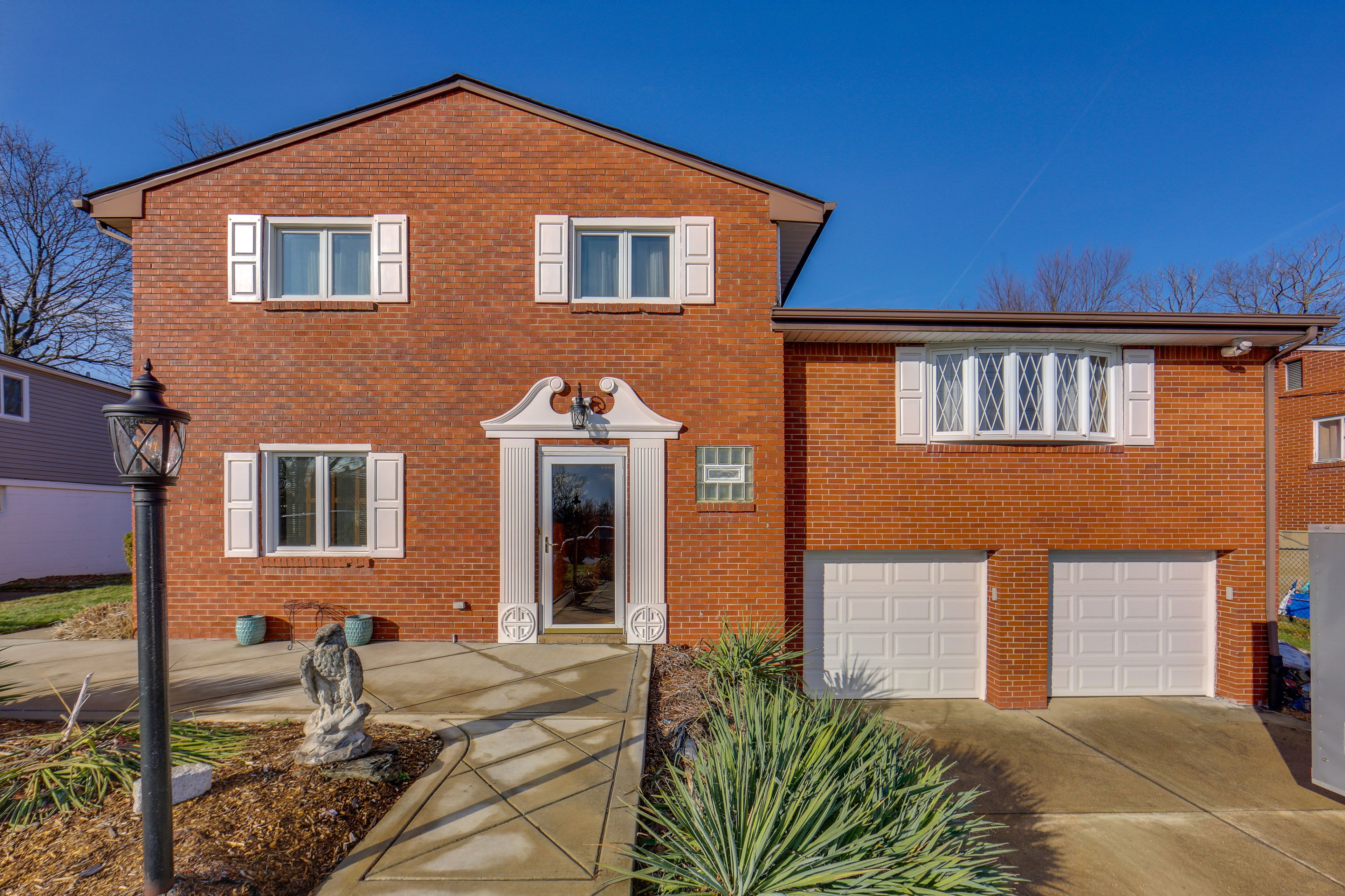 Exterior | Split-Level Home | 5 Steps to Enter | Driveway (4 Vehicles)