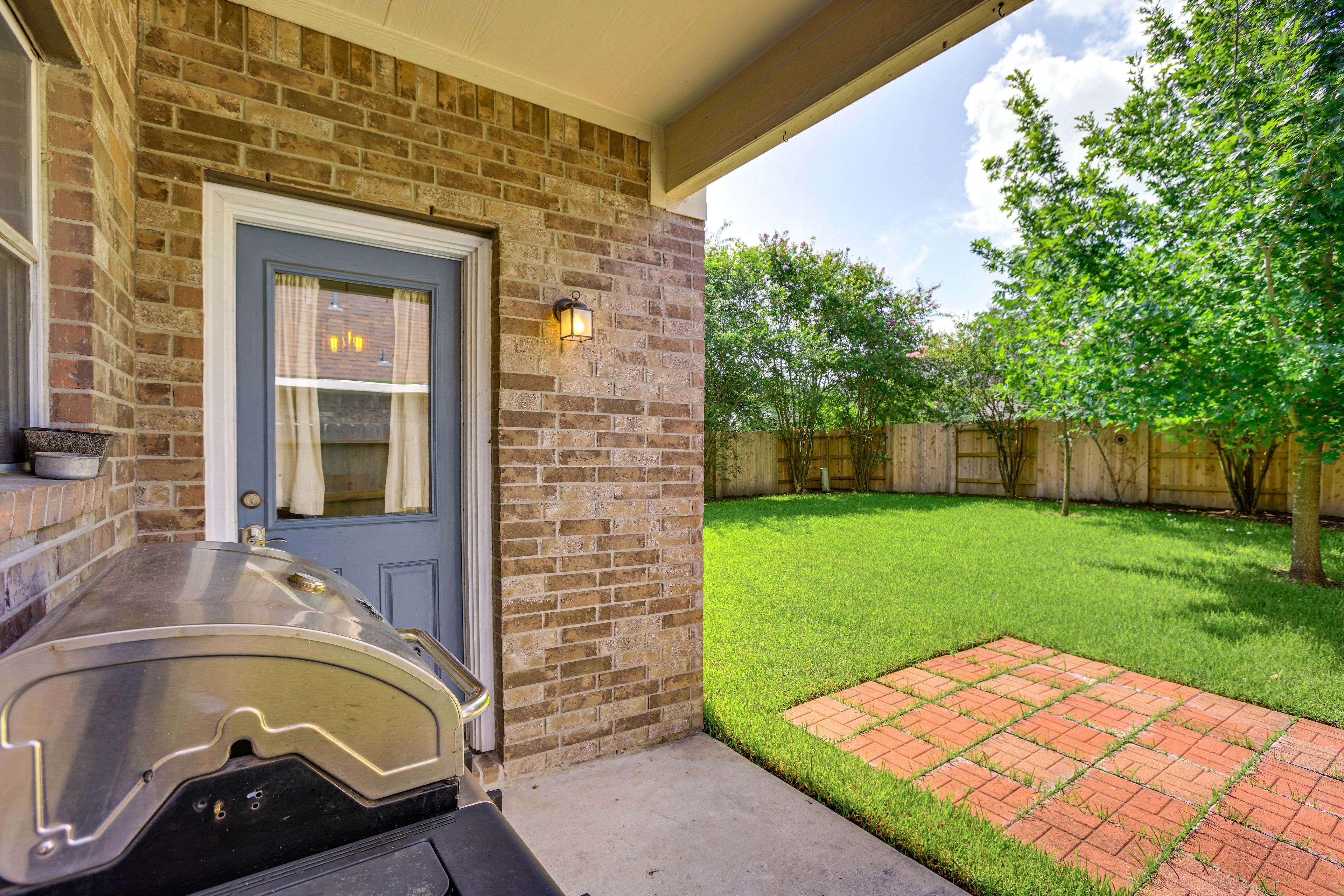 Fenced Backyard | Gas Grill