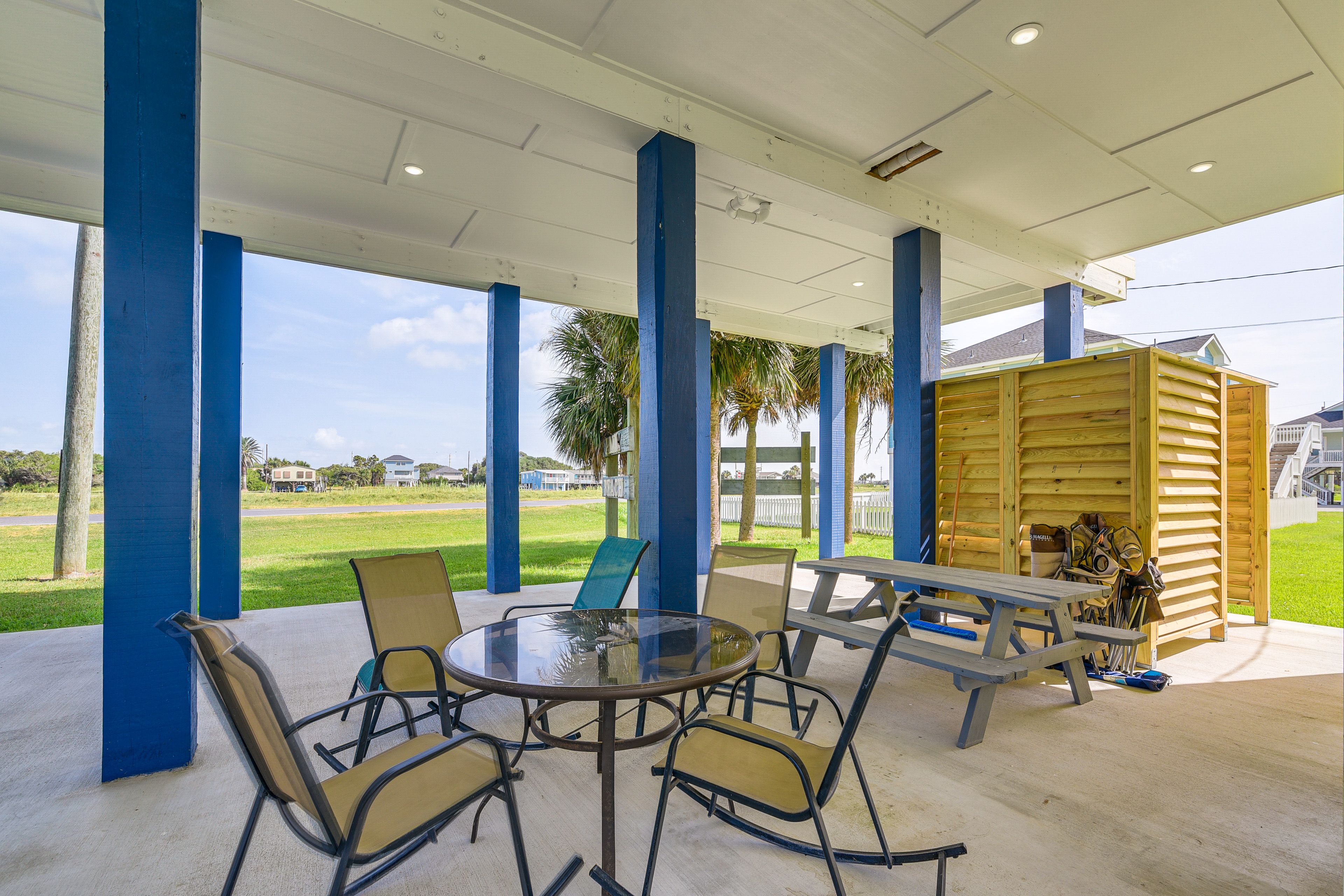 Covered Patio | Gas Grill | 2-Story Home on Stilts