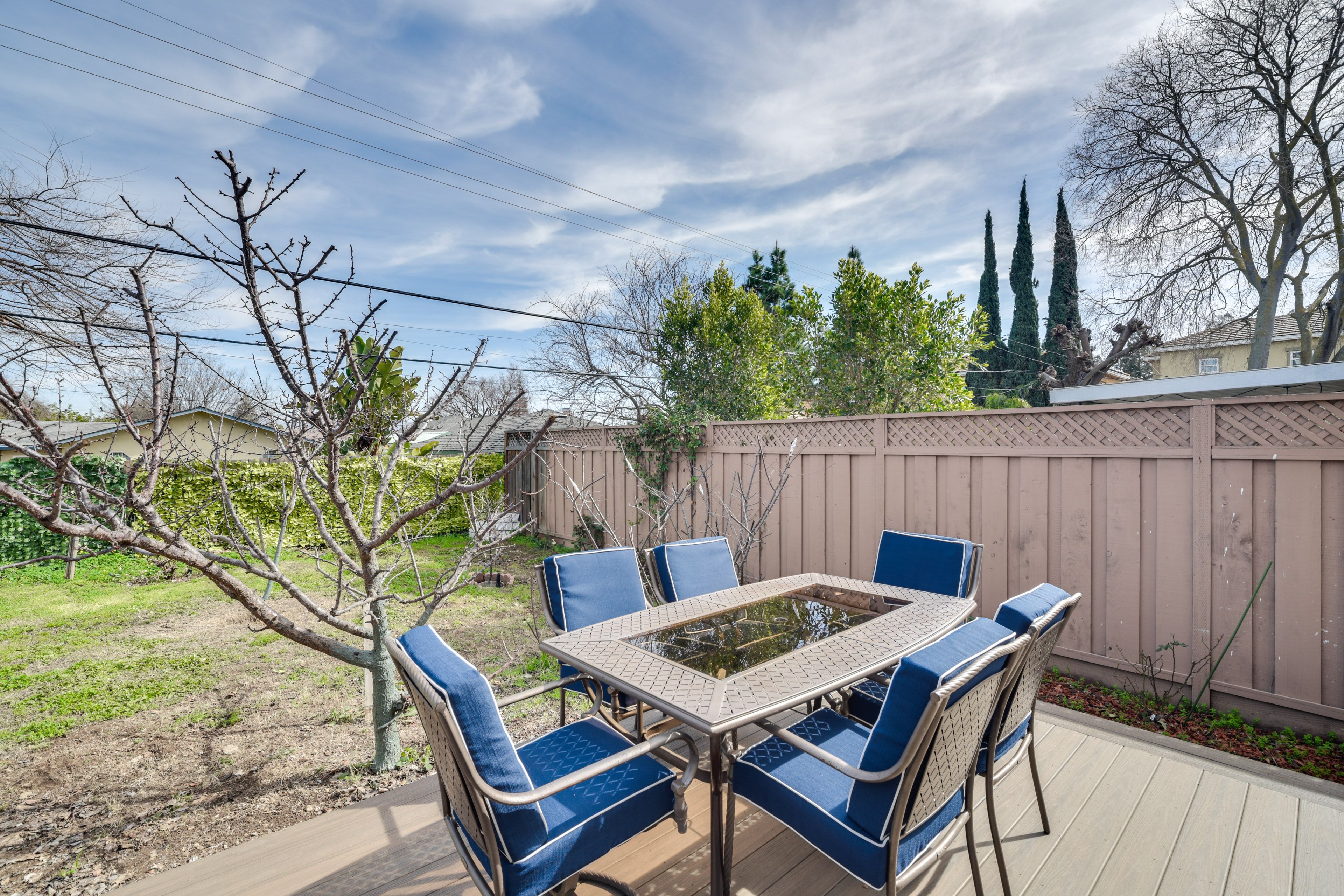 Shared Deck | Outdoor Dining Area | Fenced Backyard | Ping-Pong Table