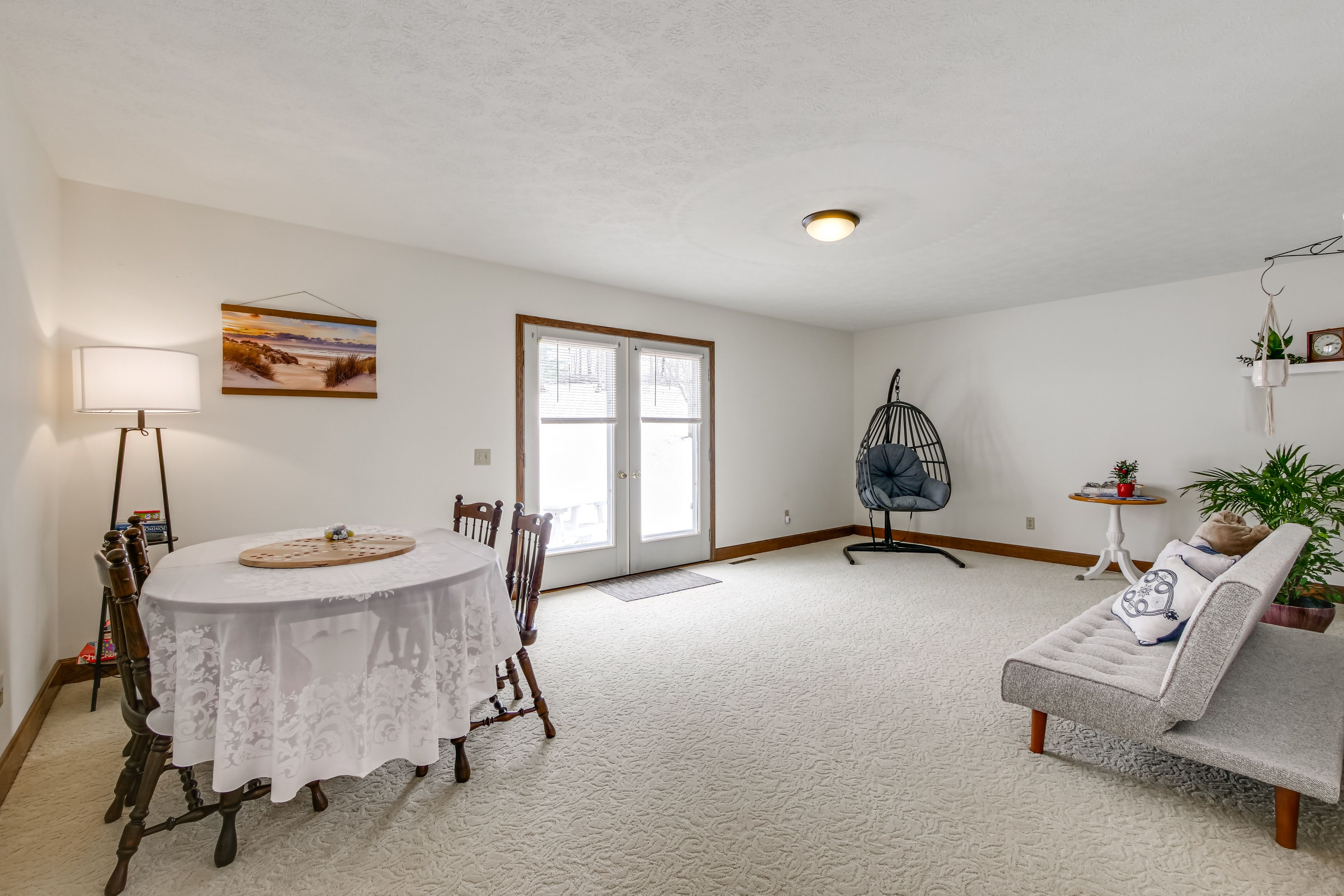 Living Room | 2nd Floor | Full Futon | Swing Chair | Additional Dining Area