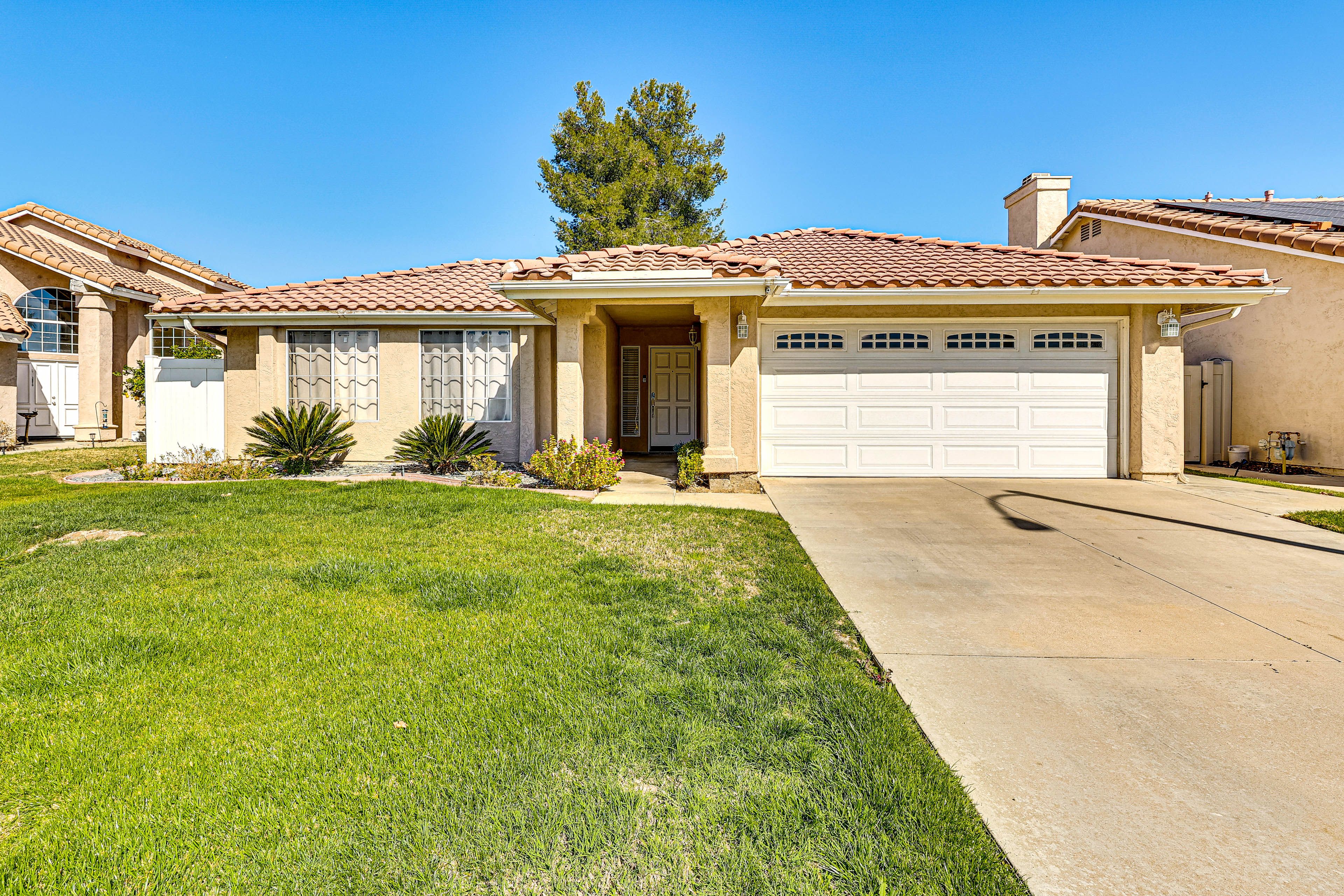 Property Exterior | Driveway Parking (2 Vehicles) | Street Parking (1 Vehicle)
