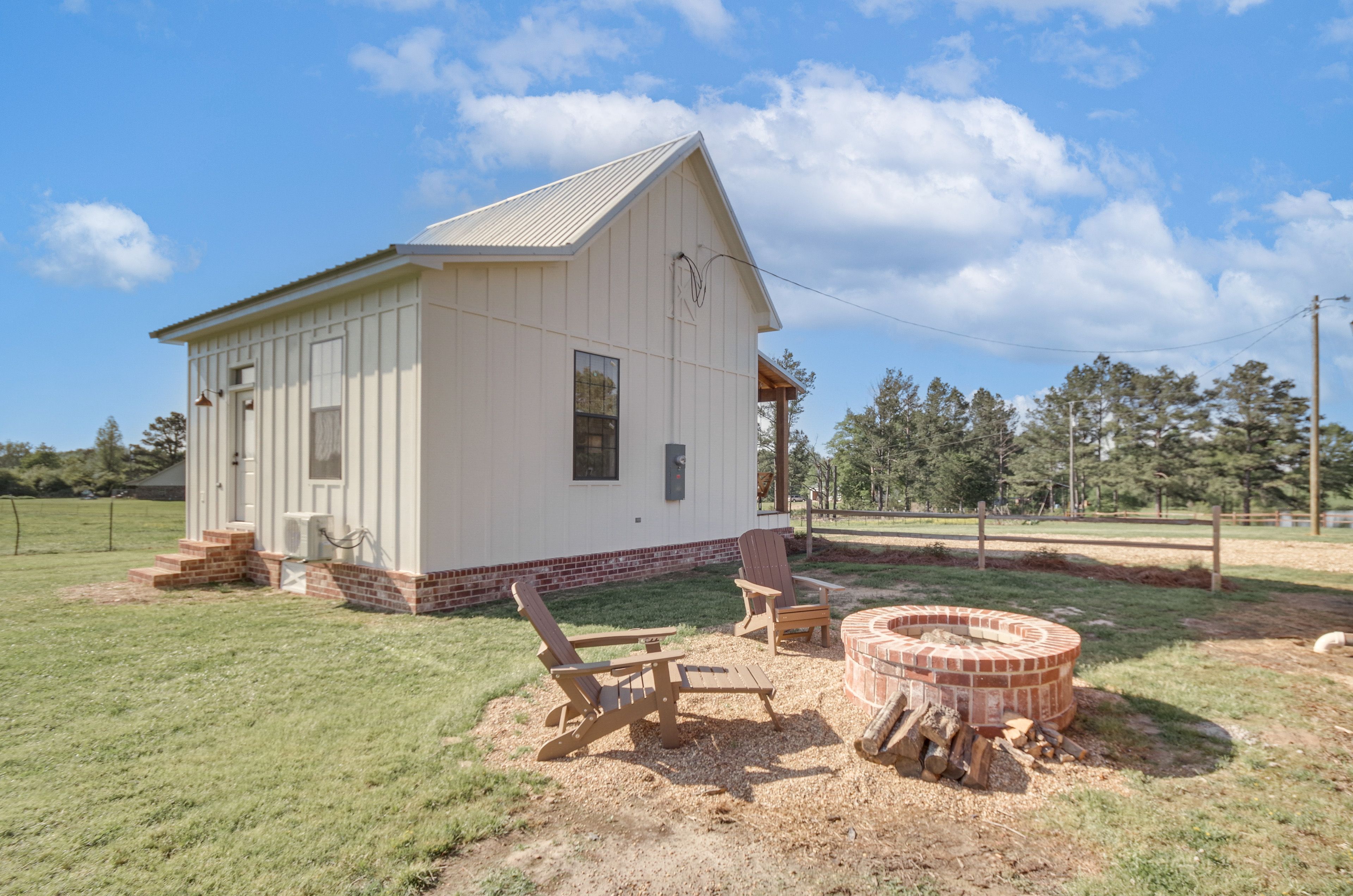 Property Exterior | Yard w/ Wood-Burning Fire Pit | Charcoal Grill