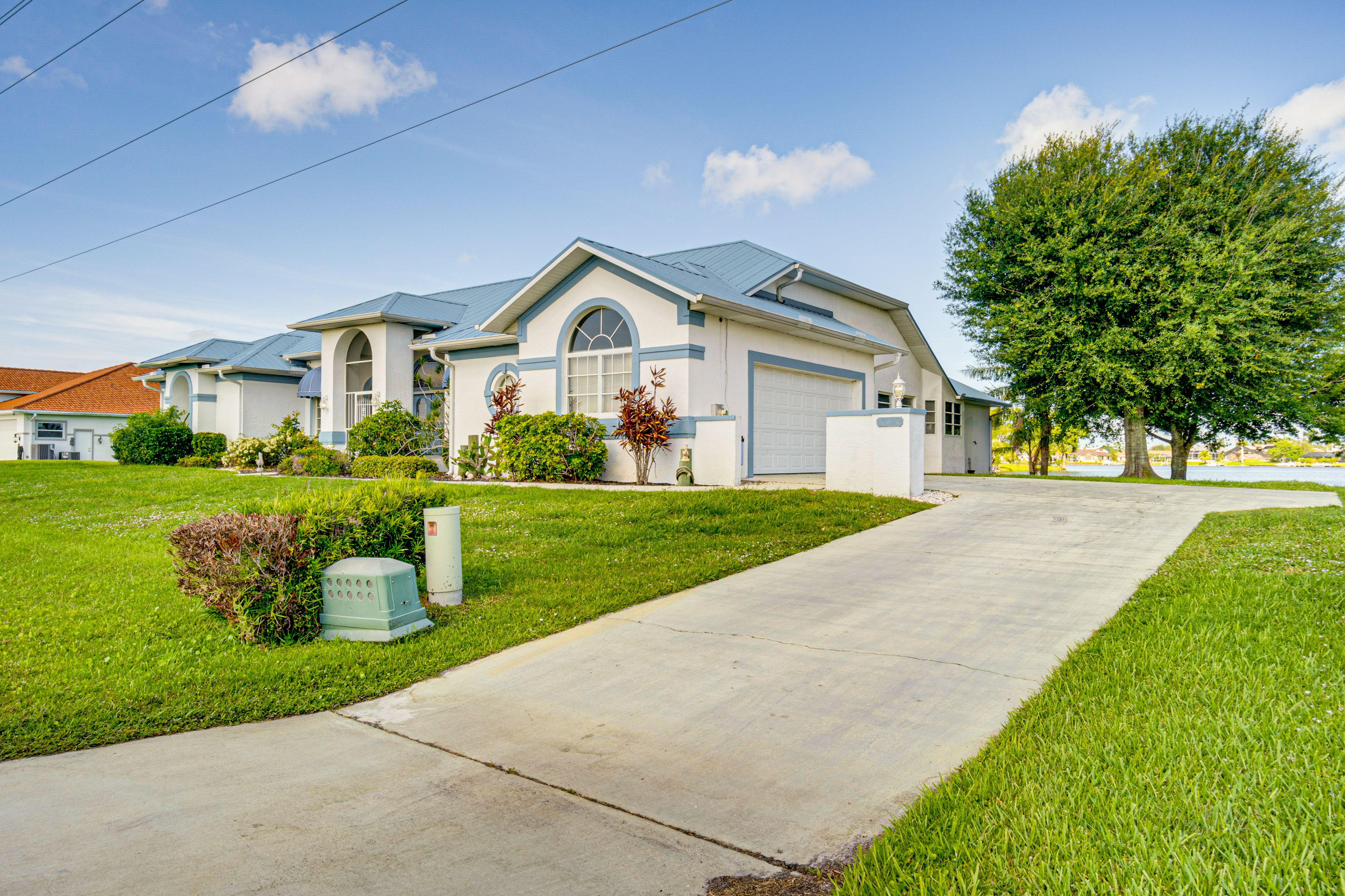 Home Exterior | Parking | Garage (2 Vehicles) | Driveway (2 Vehicles)