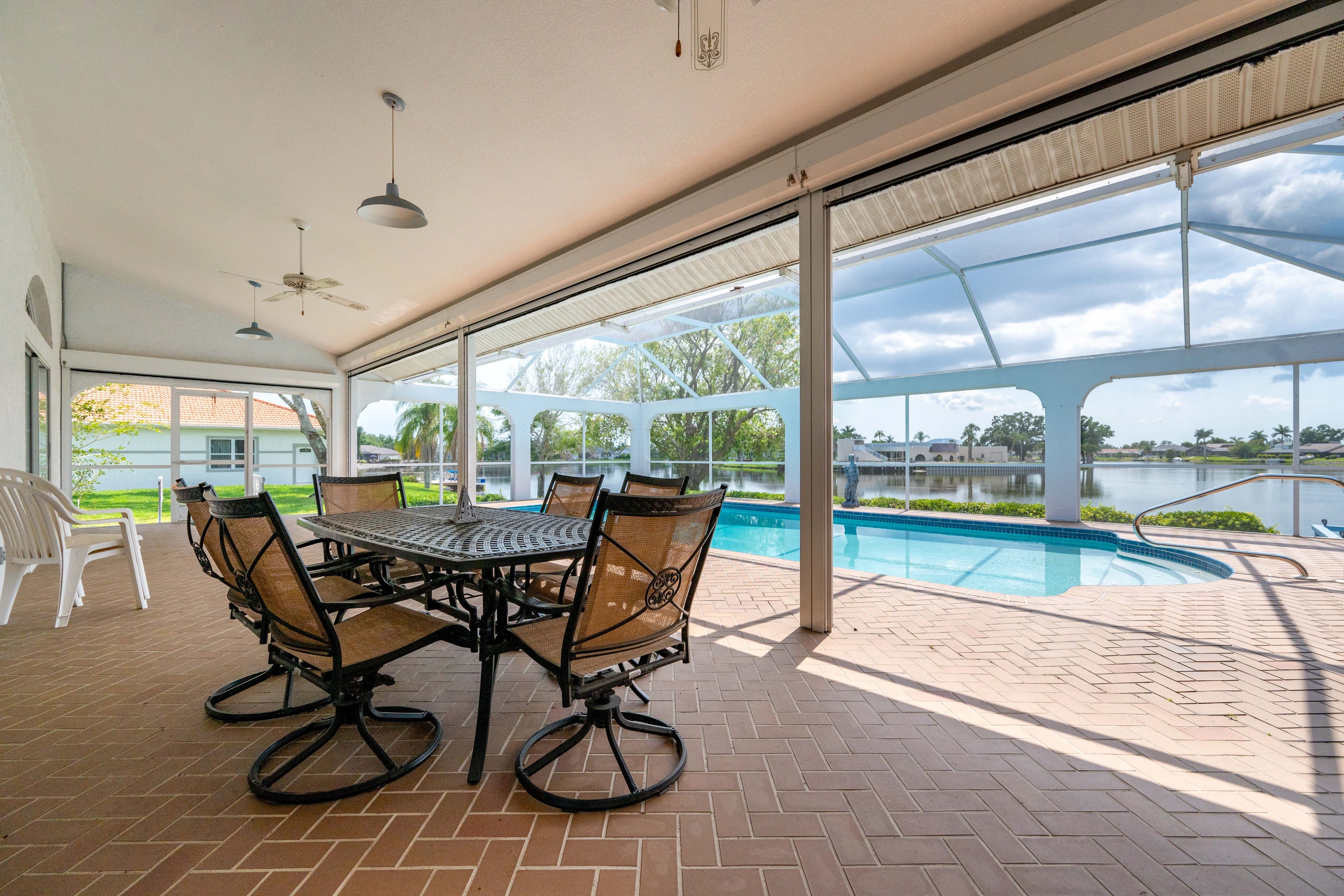 Private Patio | BBQ Grill | Screened-In Pool