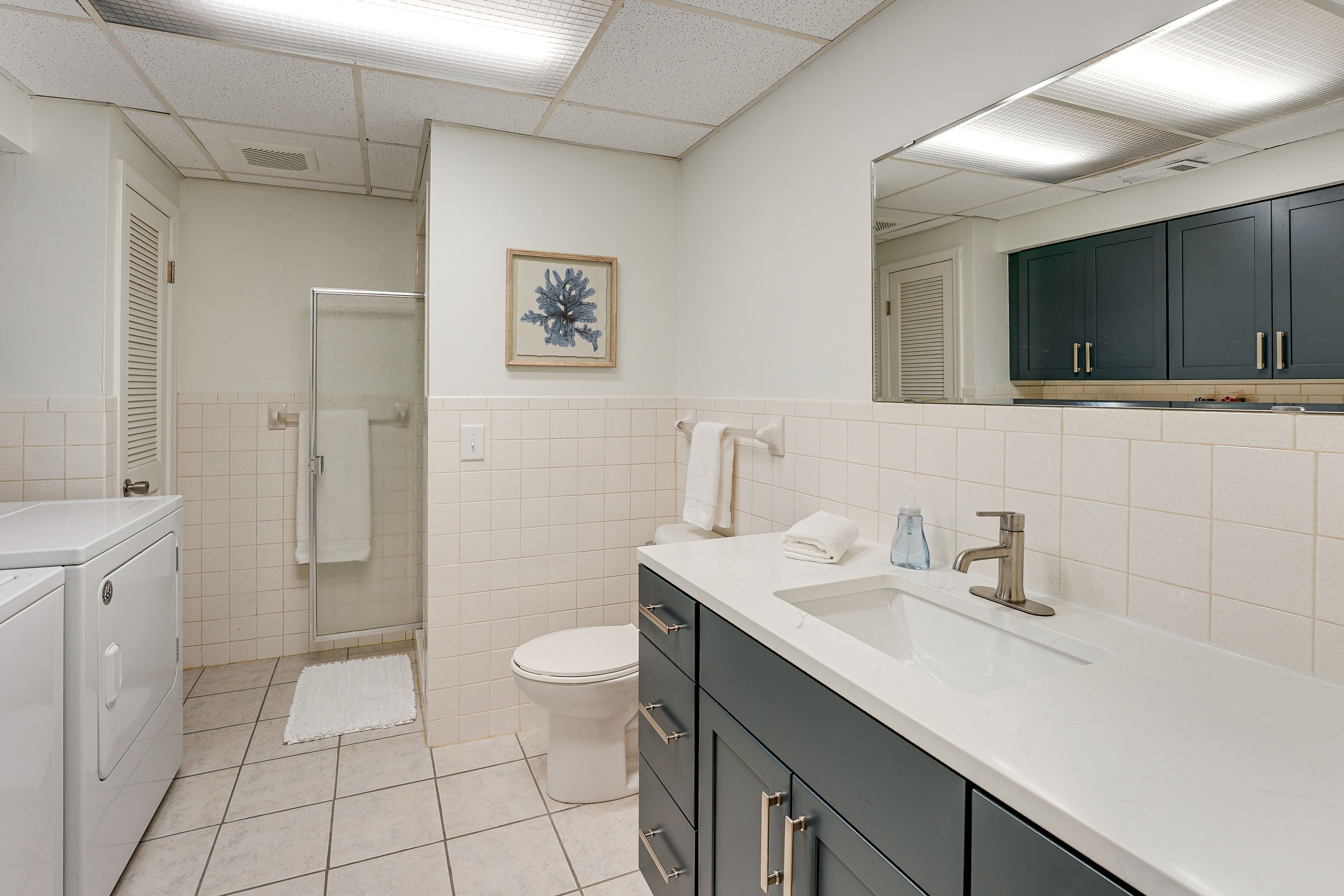 Full Bathroom & Laundry Area | Lower Level