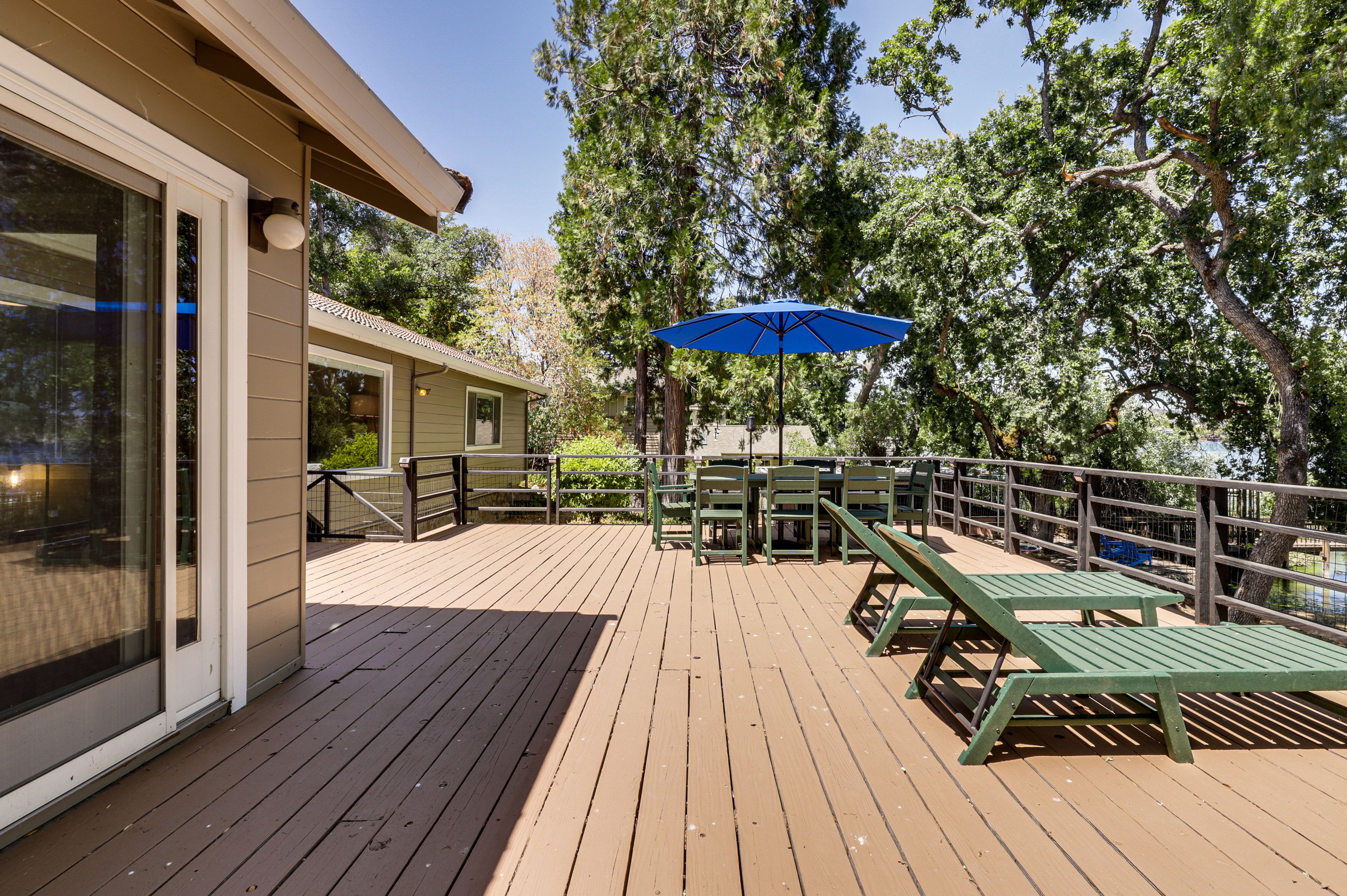 House Exterior | Furnished Deck | Dining Area | Lake Views