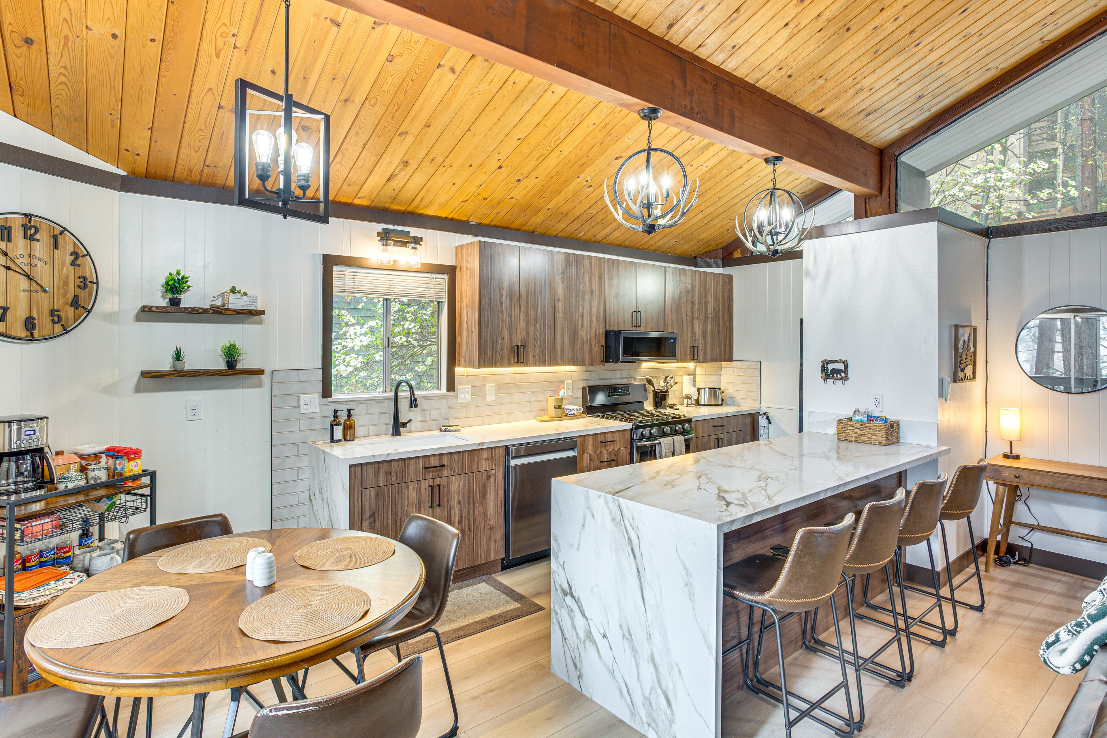 Kitchen & Dining Room | 2-Story Cabin | Main Level | Dishware & Flatware