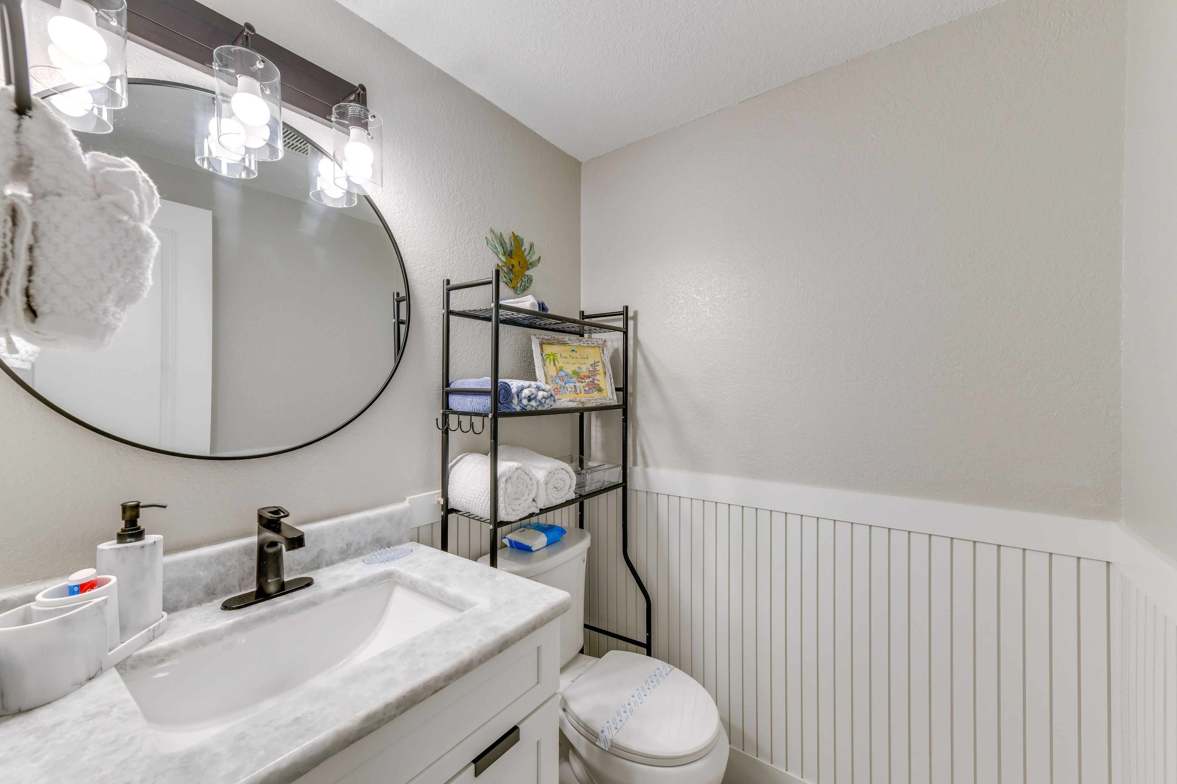 En-Suite Half Bathroom | Towels & Linens Provided